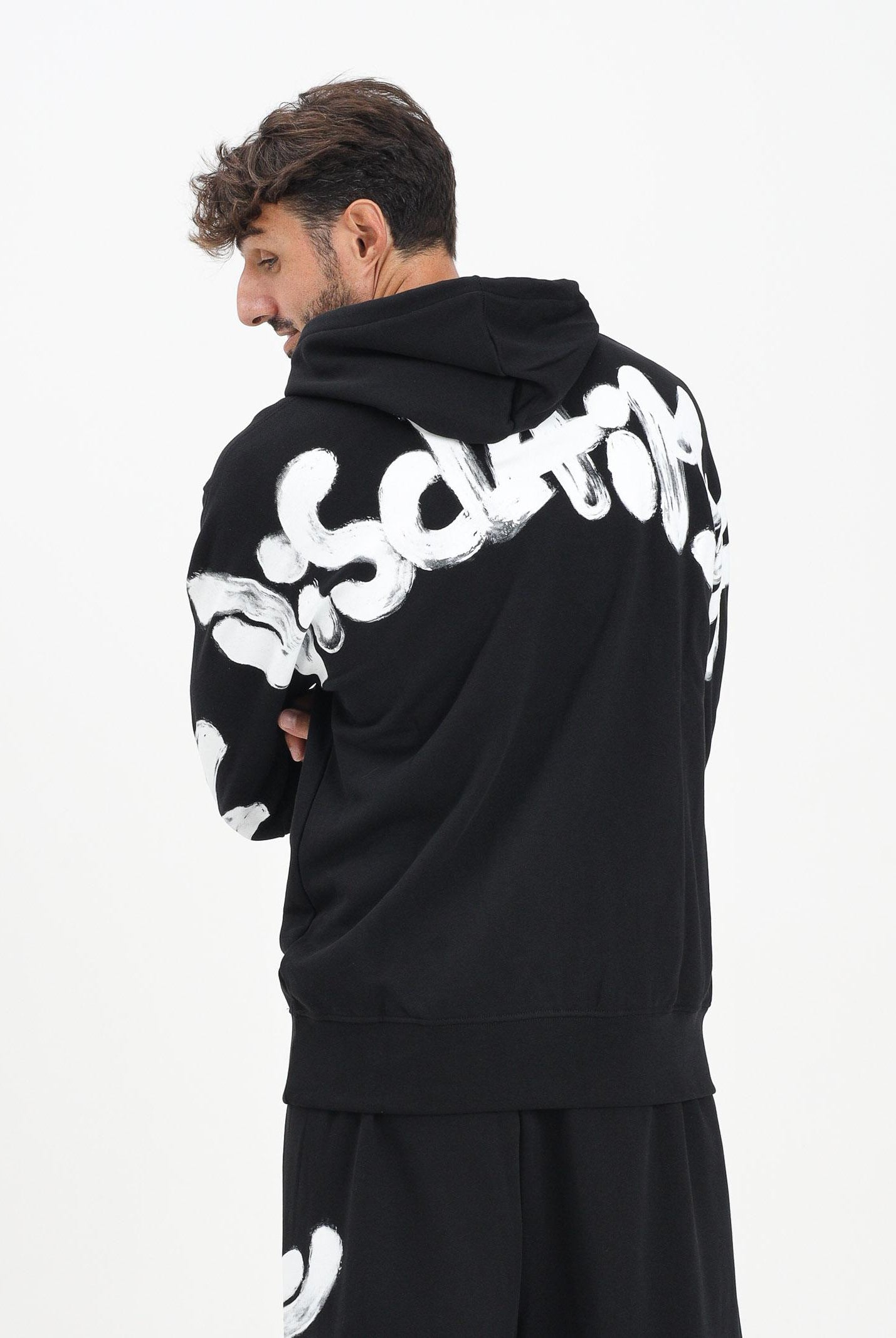 DISCLAIMER Felpa con cappuccio nera da uomo con maxi stampa logo 25IDS55100 NEBI DISCLAIMER