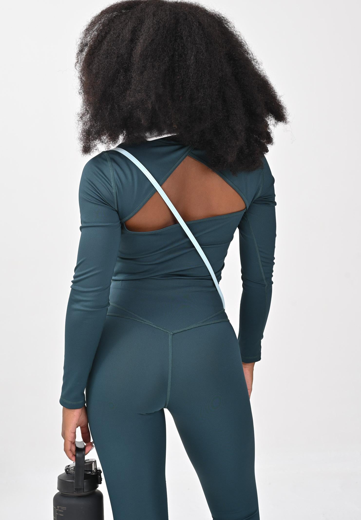 PUMA Top sportivo a maniche lunghe Terrains verde da donna 527490 75 PUMA