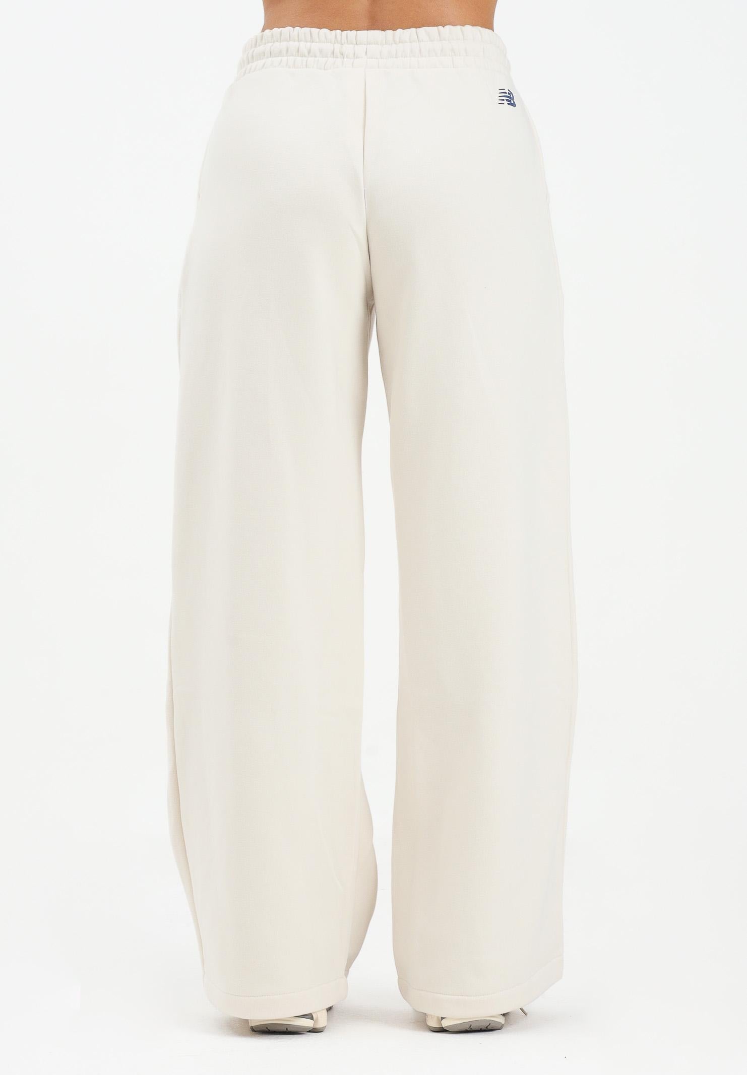 NEW BALANCE Pantalone sportivo panna da donna con logo WP53903LIN NEW BALANCE