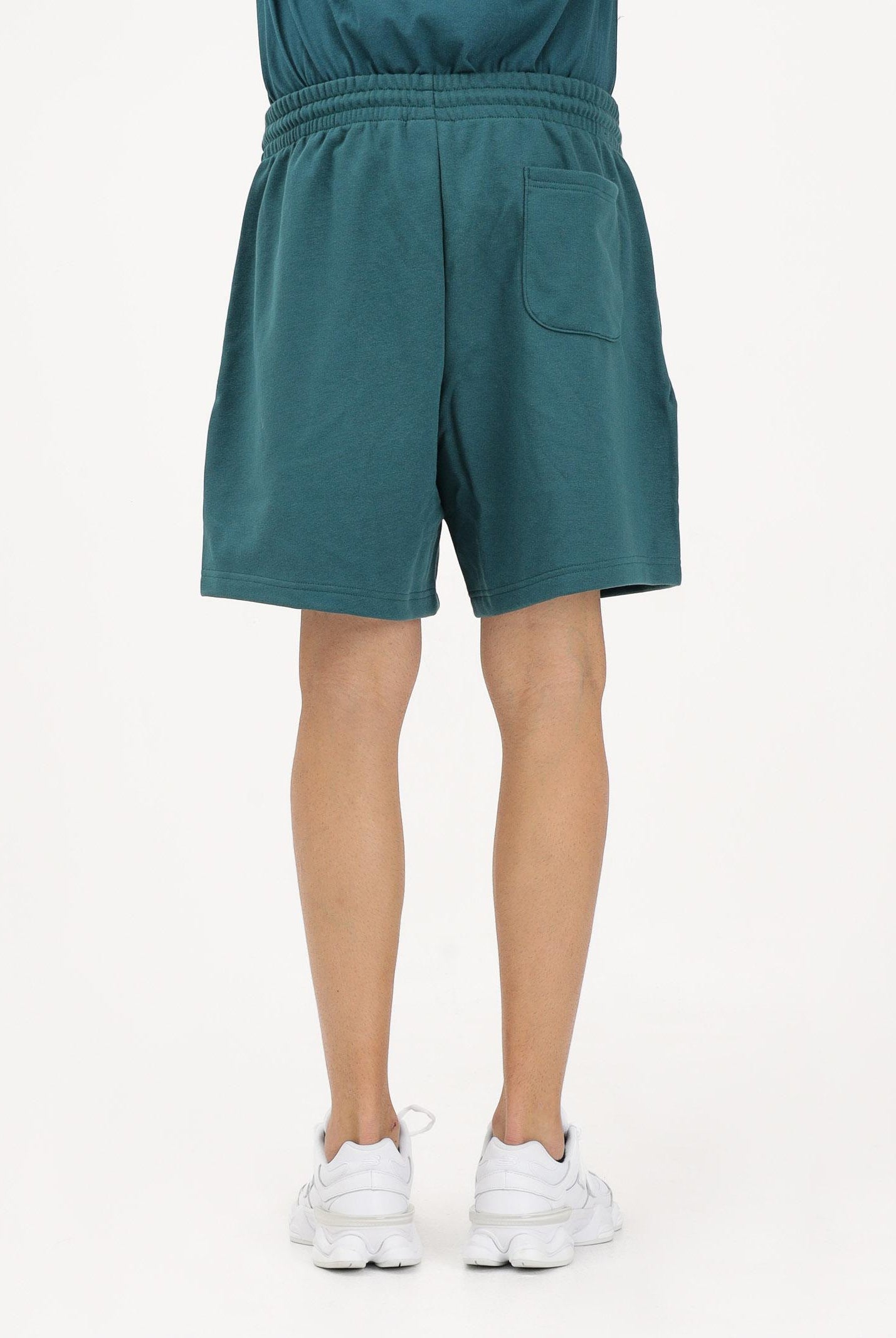 NEW BALANCE Shorts sportivo ESSENTIALS petrolio per uomo e donna MS41520AAV . NEW BALANCE