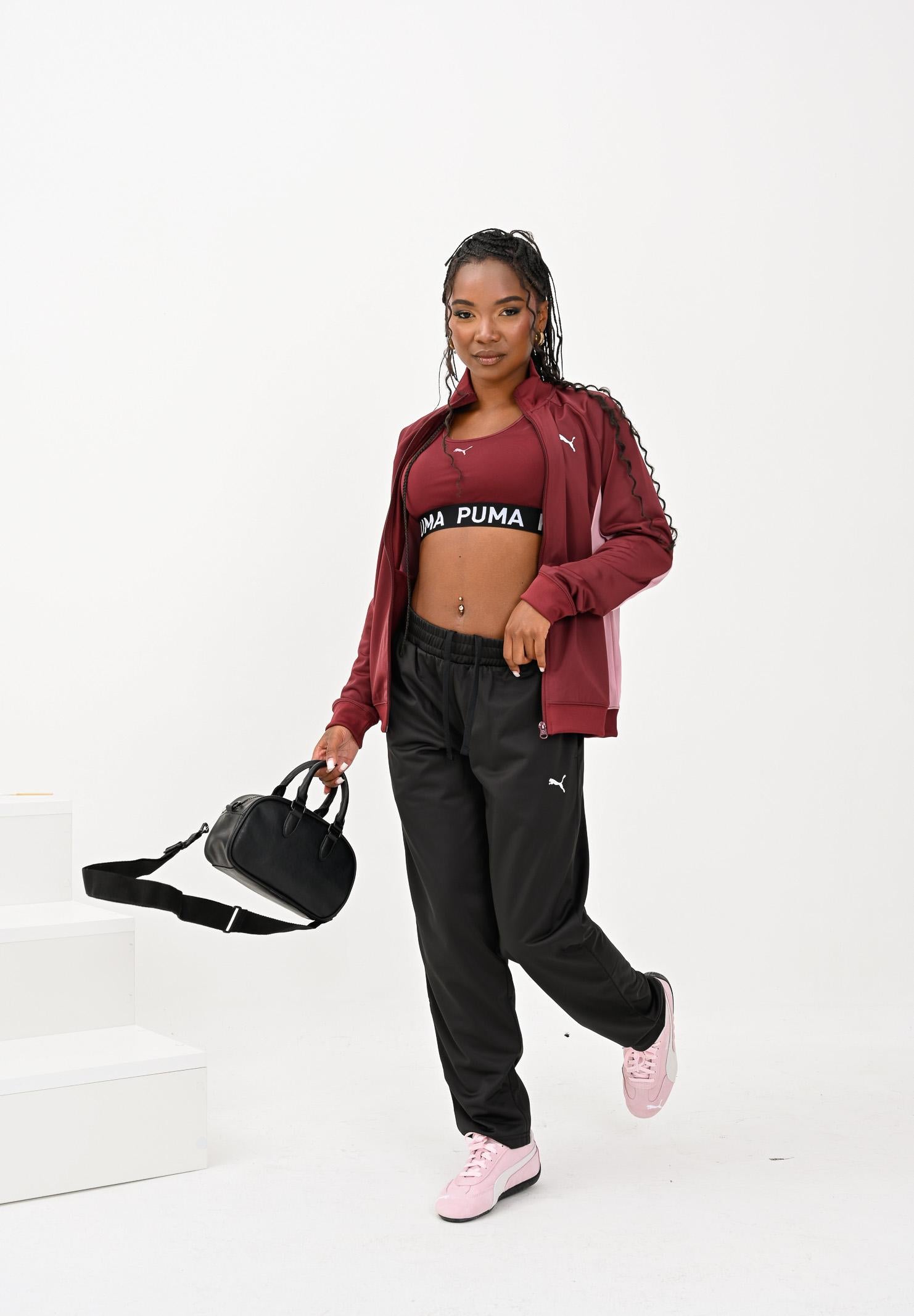 PUMA Tuta Poly bordeaux e nera da donna 688159 96 PUMA