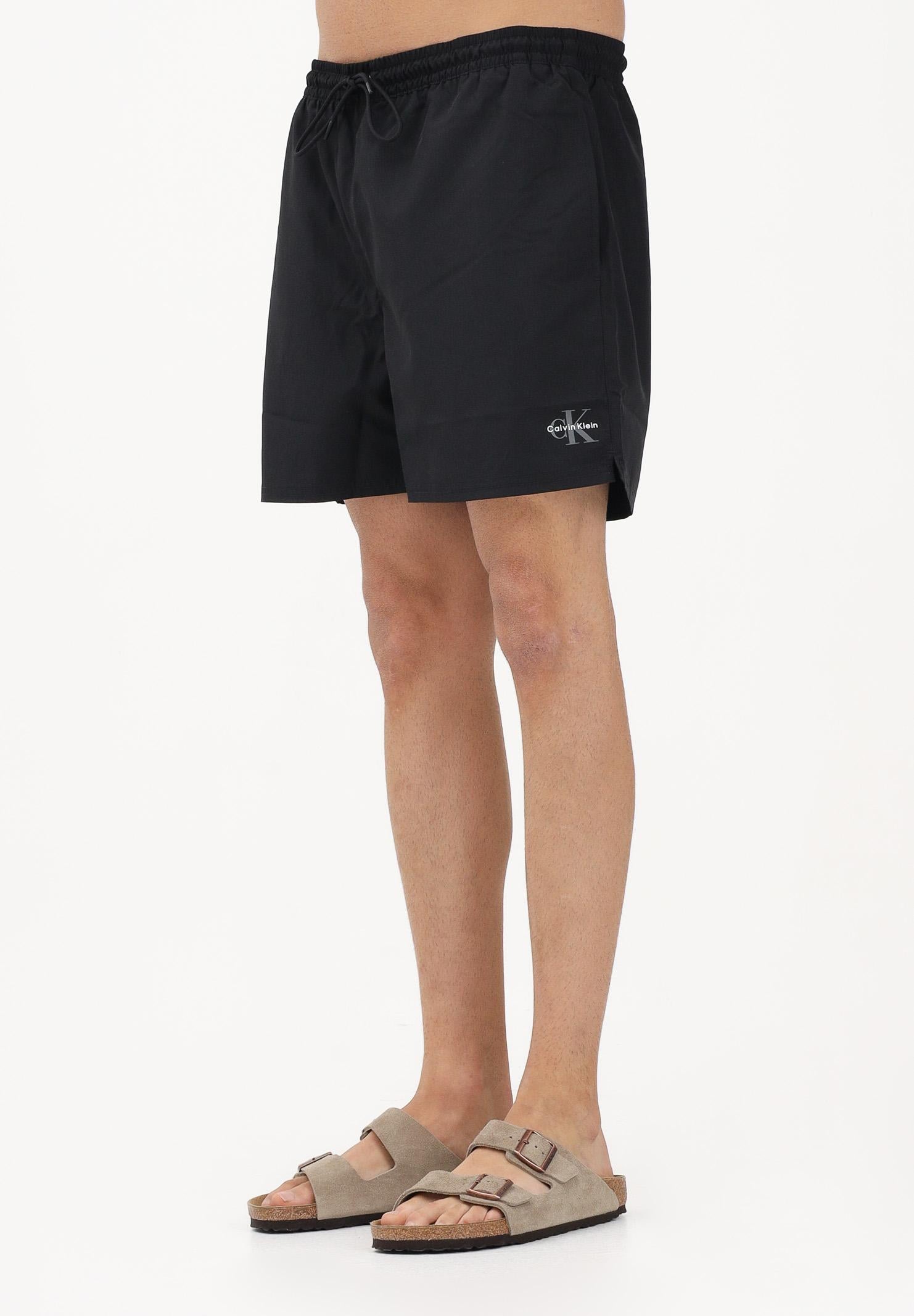 CALVIN KLEIN Shorts mare nero da uomo con logo LV00N61045 UB1 CALVIN KLEIN