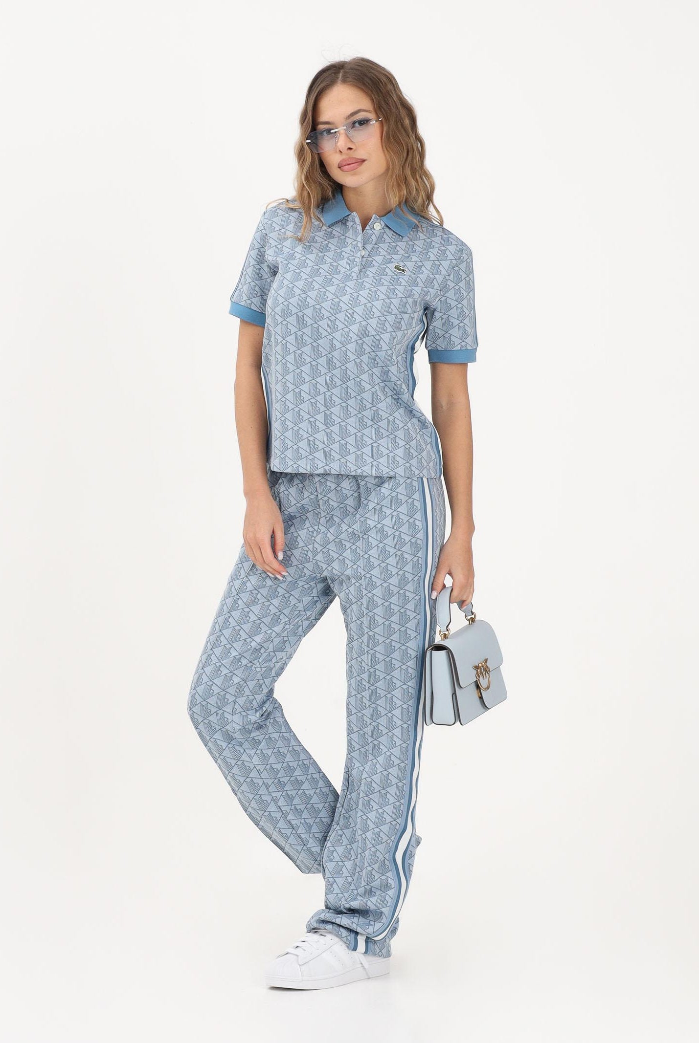 LACOSTE Pantalone sportivo azzurro da donna con motivo monogram XF9313 1QI LACOSTE
