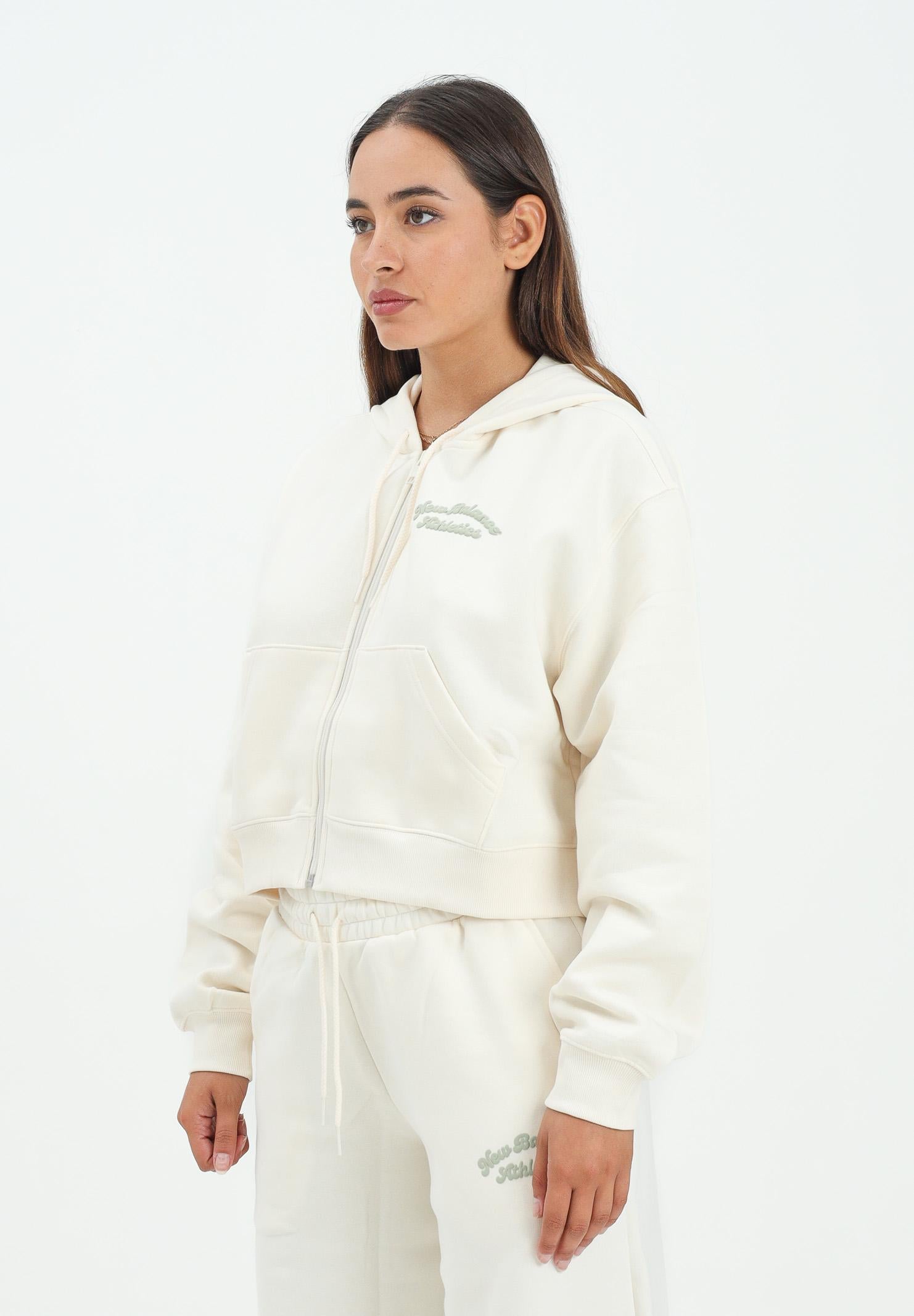 NEW BALANCE felpa con zip panna da donna con interno felpato WJ53509PEF . NEW BALANCE