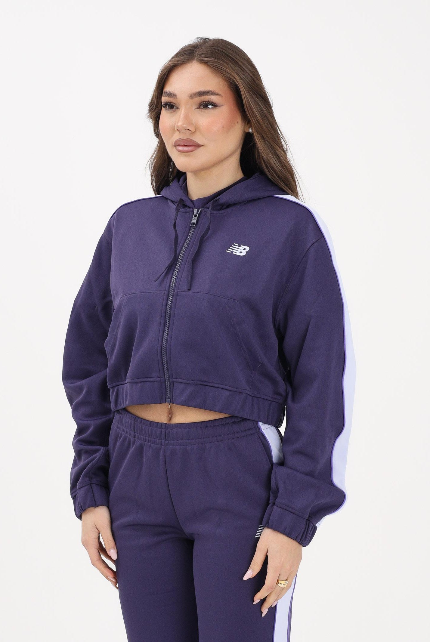 NEW BALANCE Felpa con zip Interlock viola da donna WJ61B759BOY . NEW BALANCE