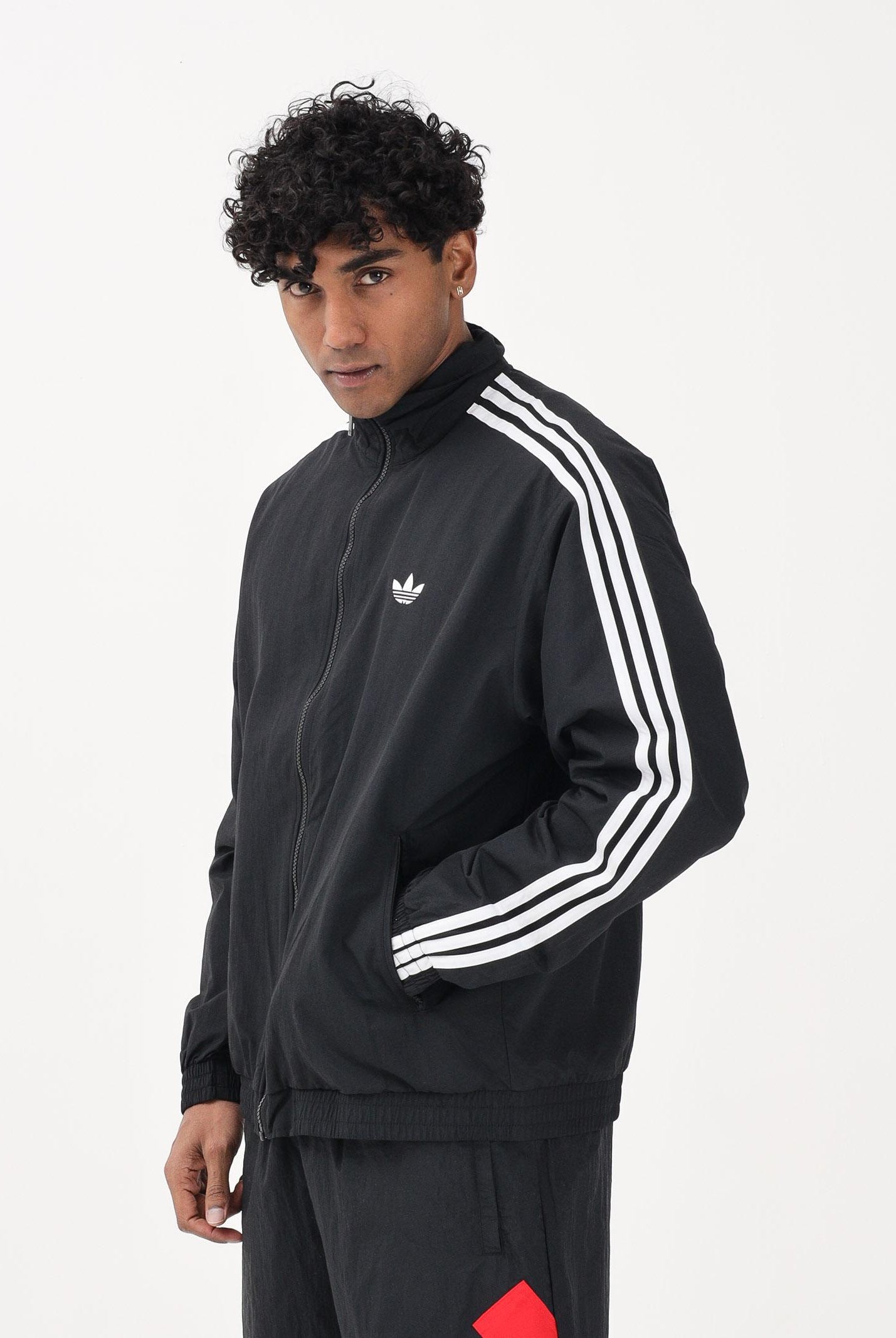 ADIDAS ORIGINALS Giacca a vento Firebird Woven nera da uomo KE1366 . ADIDAS ORIGINALS