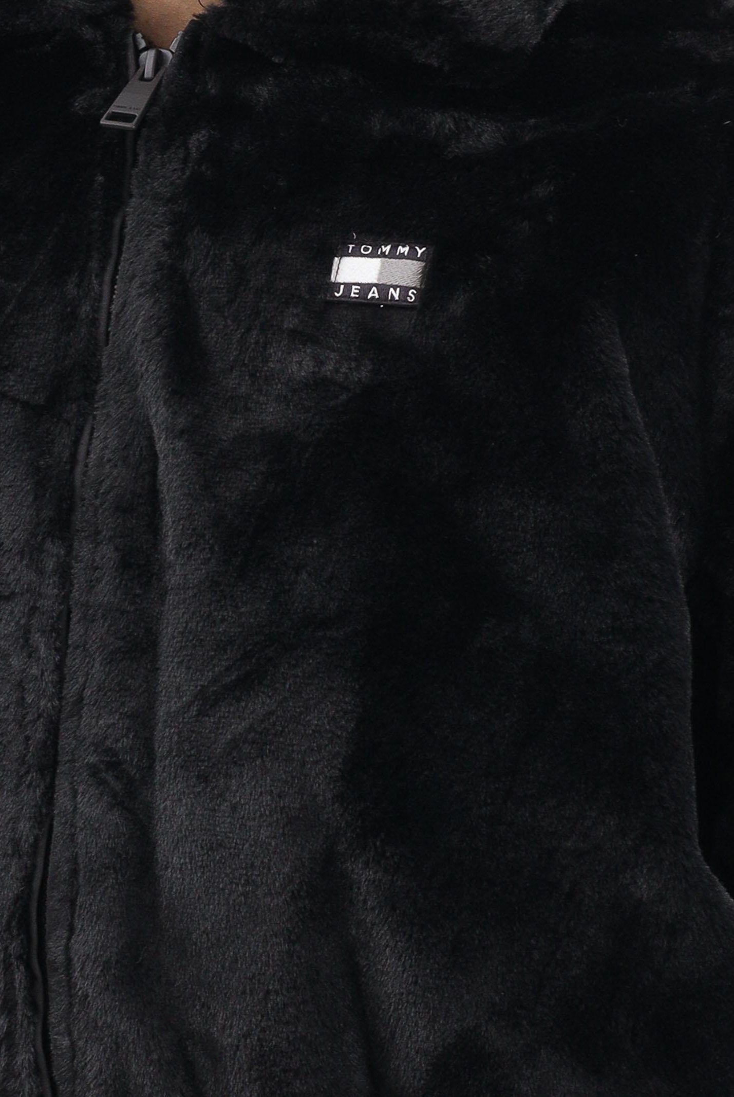 TOMMY JEANS Pelliccia sintetica nera da donna con logo DW0DW21669BDS TOMMY JEANS