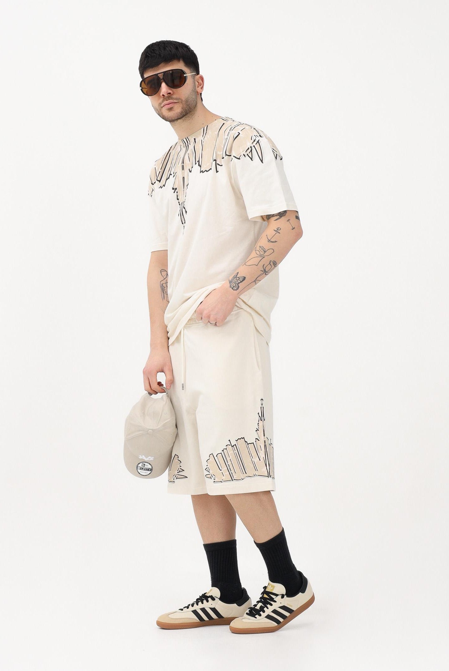 MARCELO BURLON COUNTY OF MILAN Shorts sportivo panna da uomo con stampa S6CMMABE018 412 MARCELO BURLON COUNTY OF MILAN