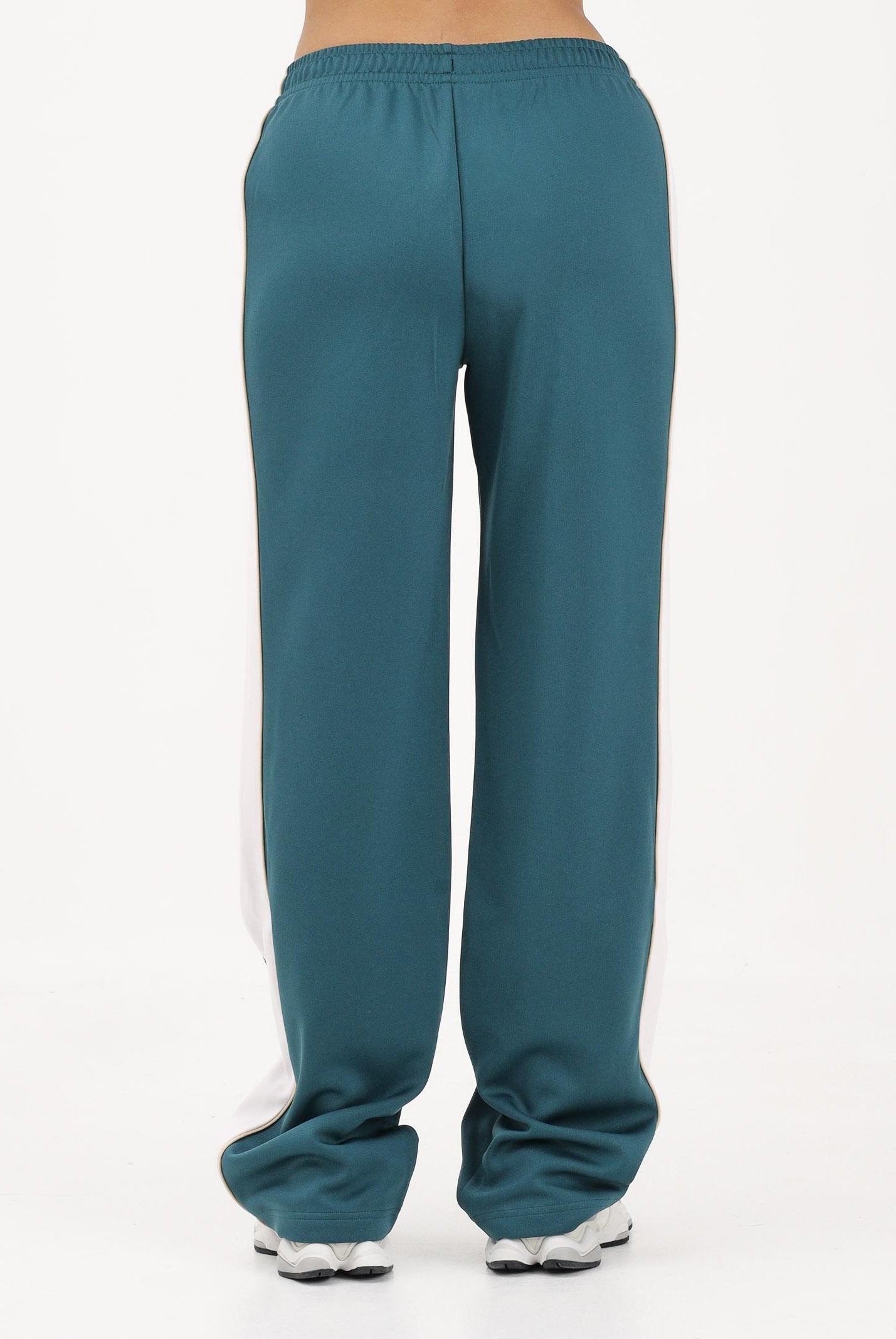 NEW BALANCE Pantalone sportivo Interlock verde da donna WB61Q2R4AAV . NEW BALANCE