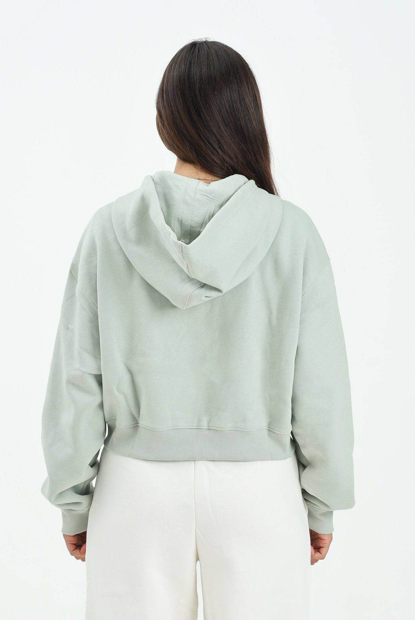 NEW BALANCE felpa con zip verde salvia da donna con interno felpato WJ53509GAS . NEW BALANCE