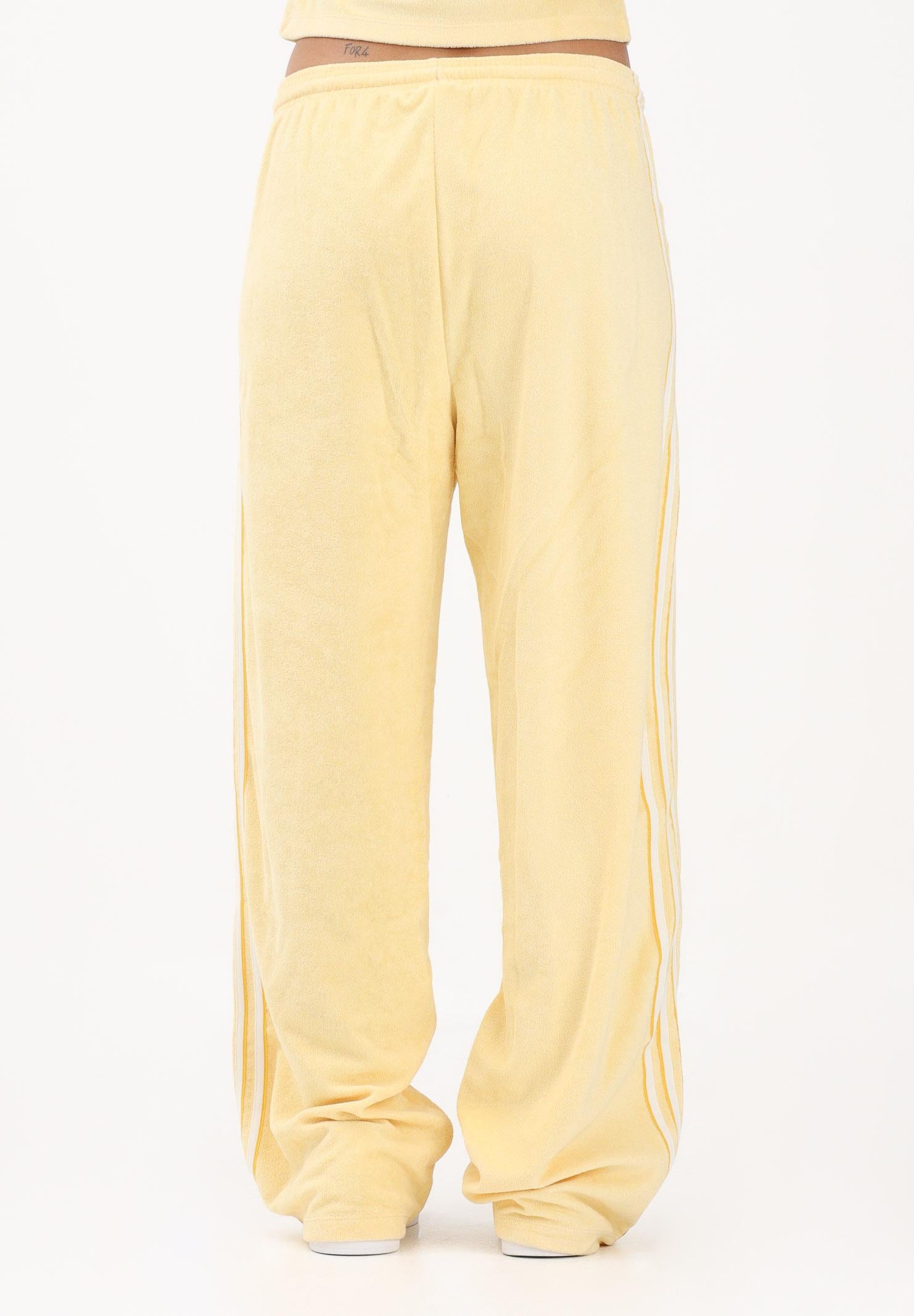 ADIDAS ORIGINALS Pantalone sportivo in spugna asciugamano Firebird giallo da donna KD1413 . ADIDAS ORIGINALS