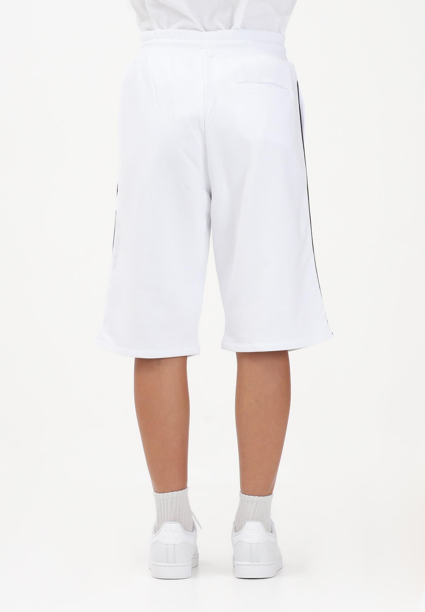 GCDS Shorts sportivo bianco per uomo e donna con bande laterali C1MEQL214F004 100B GCDS