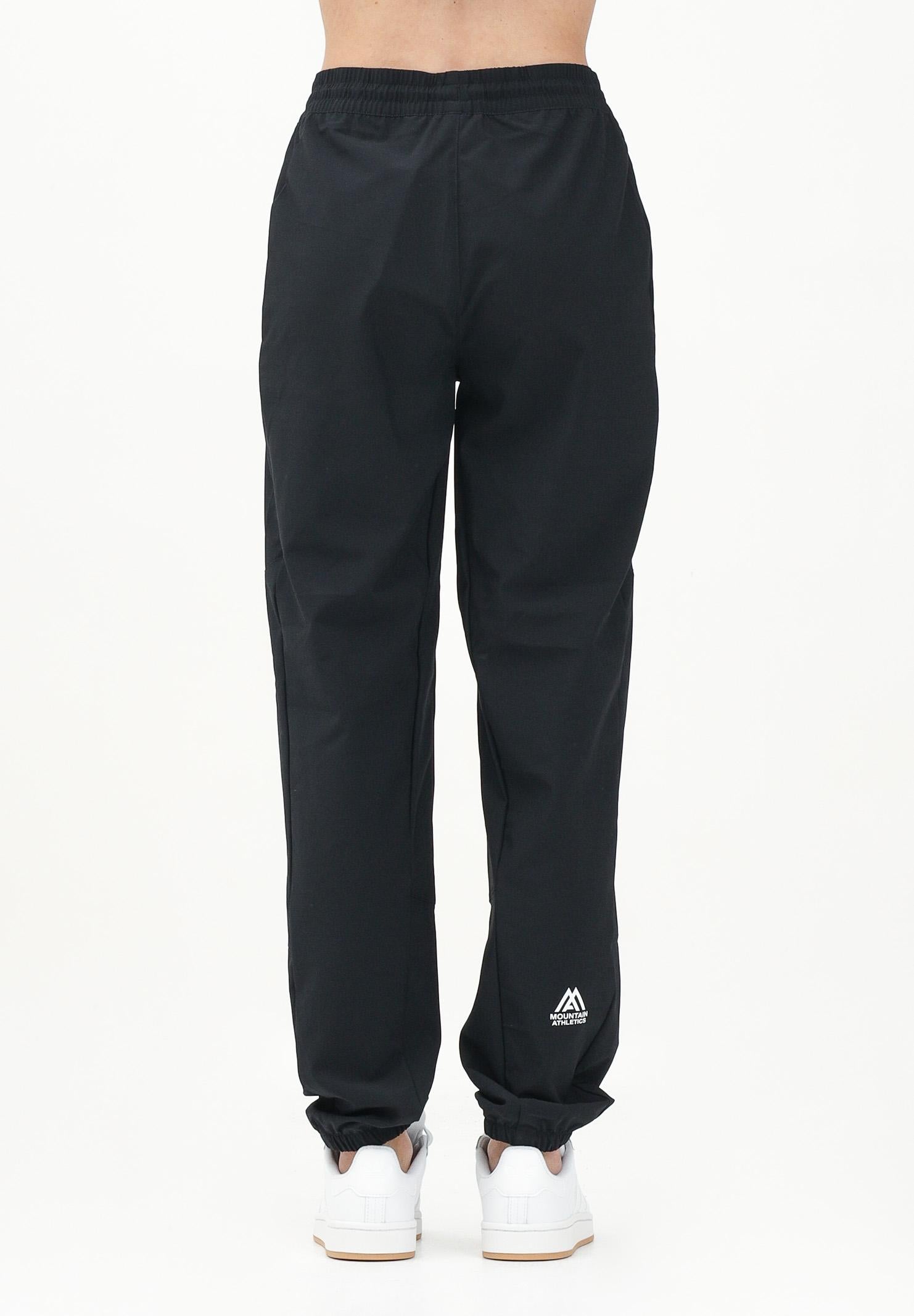 THE NORTH FACE Pantalone antivento Mountain Athletics nero da donna NF0A8BGPJK31 THE NORTH FACE