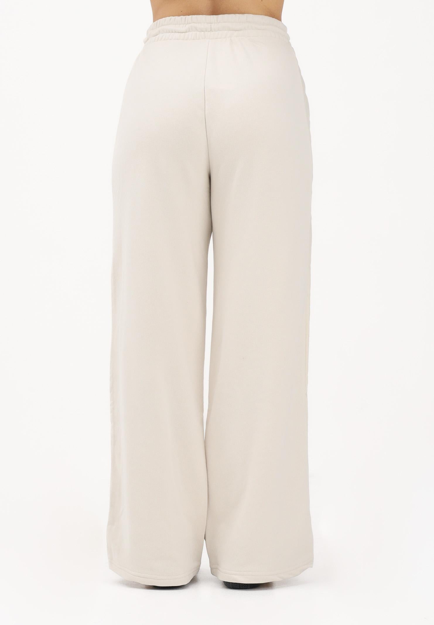 PUMA Pantalone sportivo HER panna da donna 691889 87 PUMA