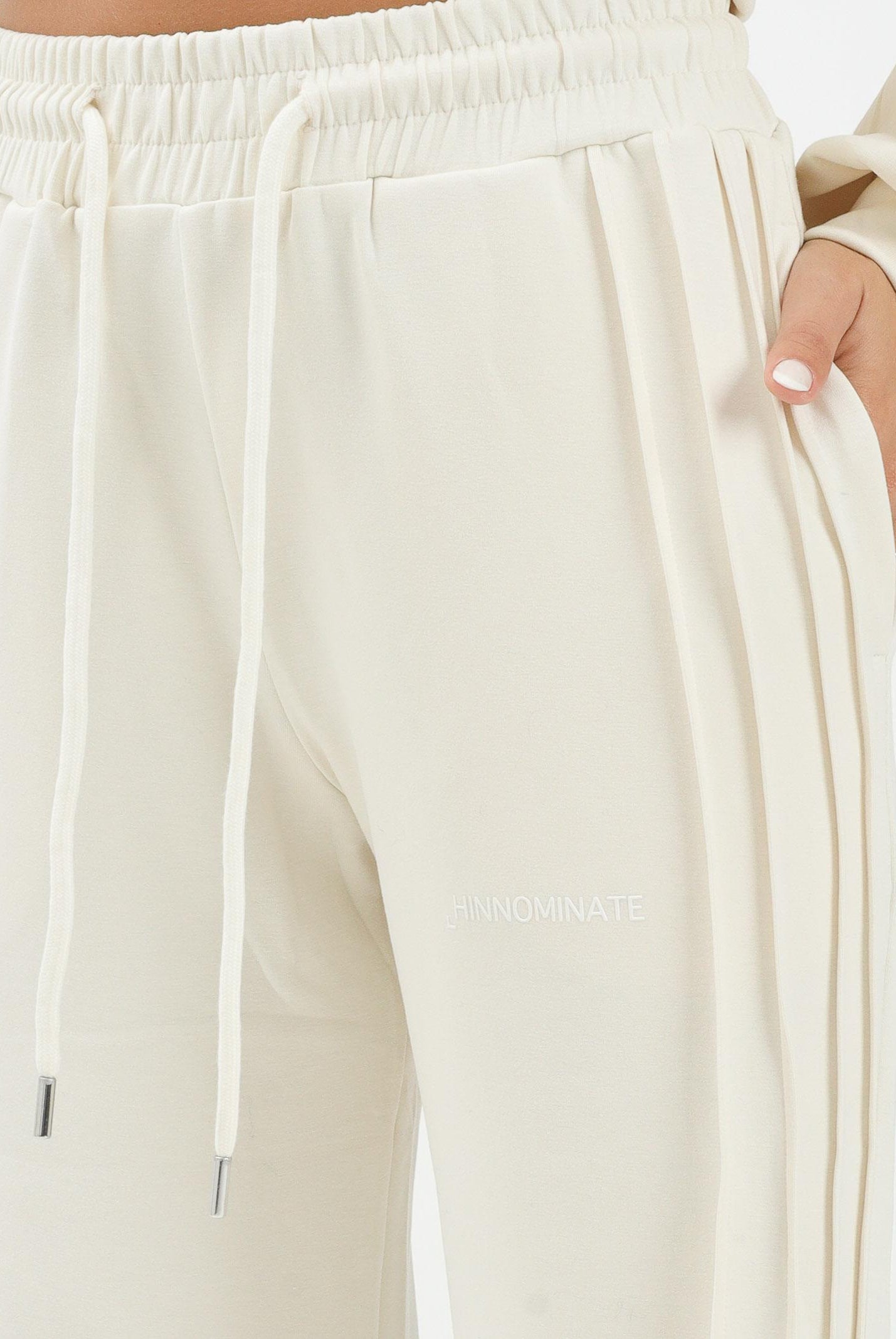 HINNOMINATE Pantalone sportivo panna da donna con nervature laterali HMABW01995 BI04 HINNOMINATE
