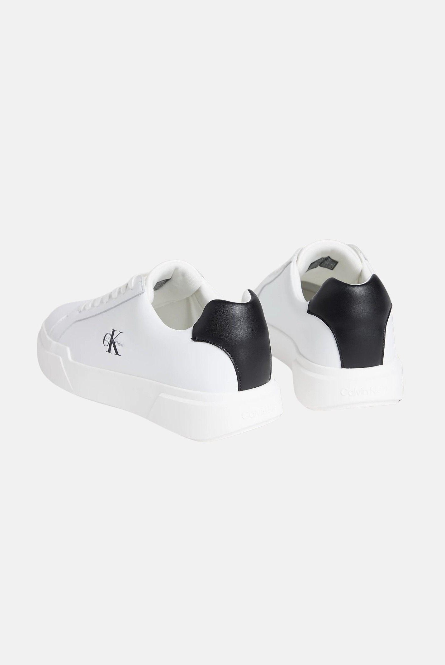 CALVIN KLEIN JEANS Sneakers in pelle con logo, colore brand White/Black/White corrispondente al bianco e nero, da uomo. YM0YM01344 06X CALVIN KLEIN JEANS