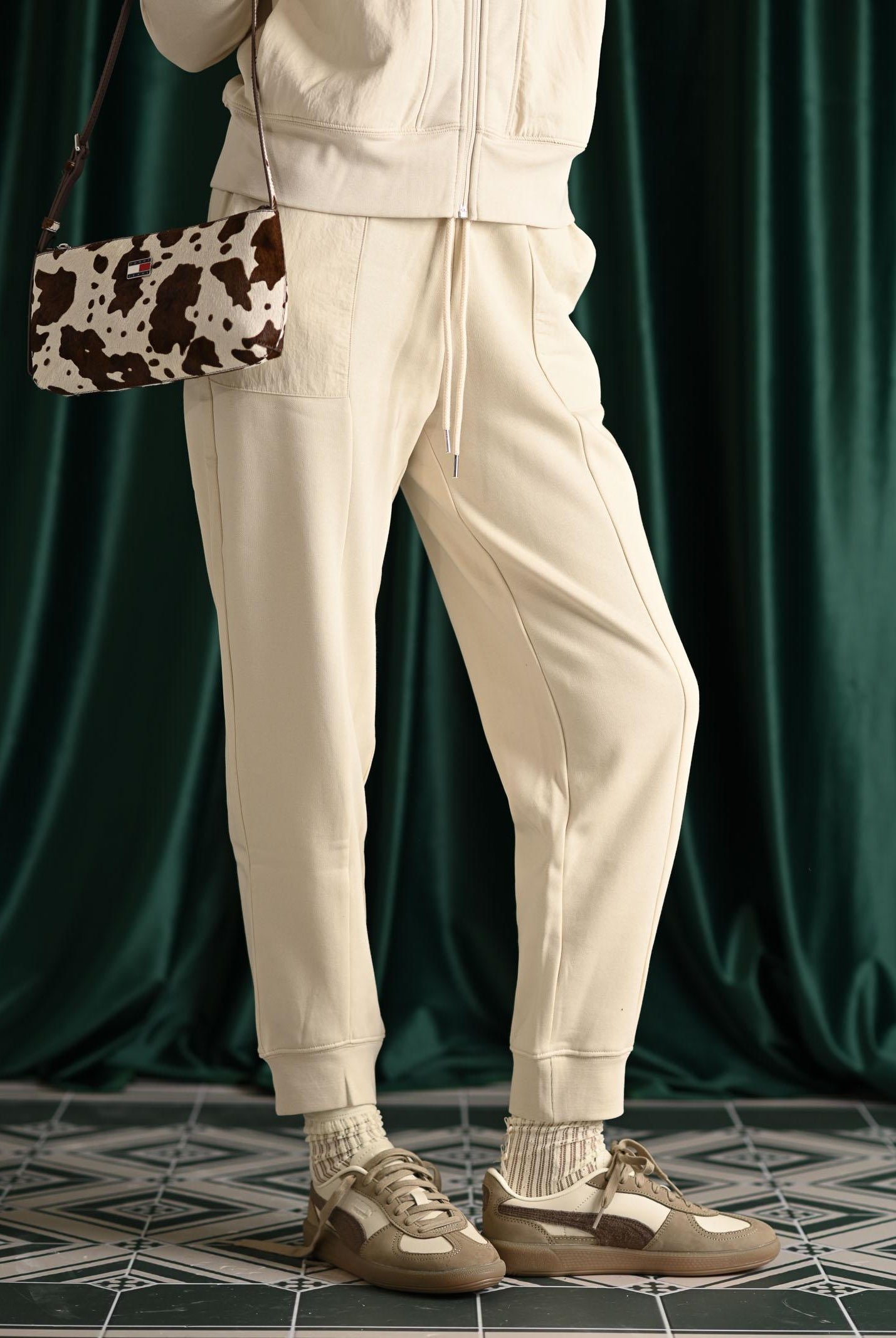 PUMA Pantalone sportivo HER panna da donna 688154 87 PUMA