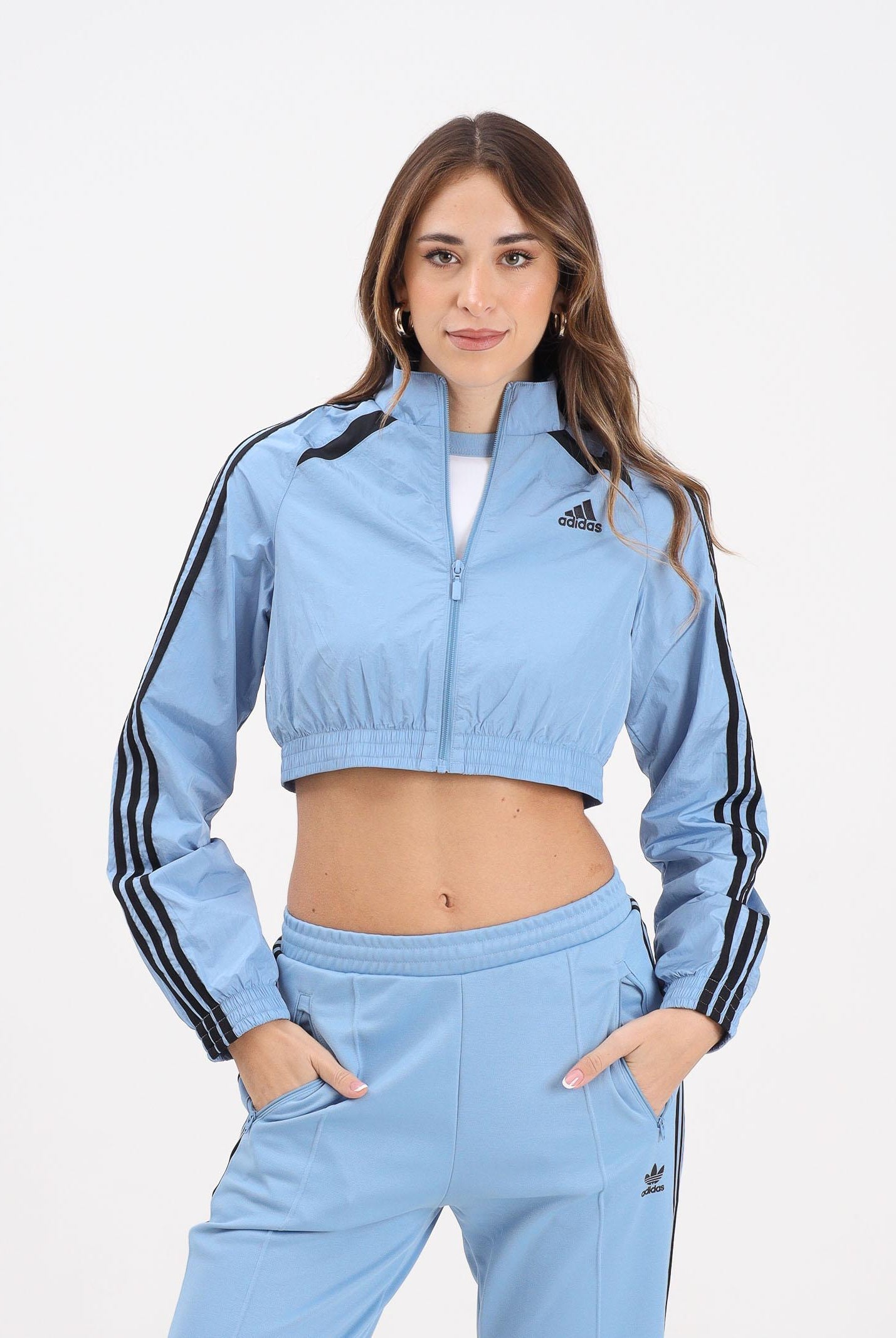 ADIDAS ORIGINALS Giacca a vento Teamgeist adicolor Cropped azzurra da donna JZ8277 . ADIDAS ORIGINALS