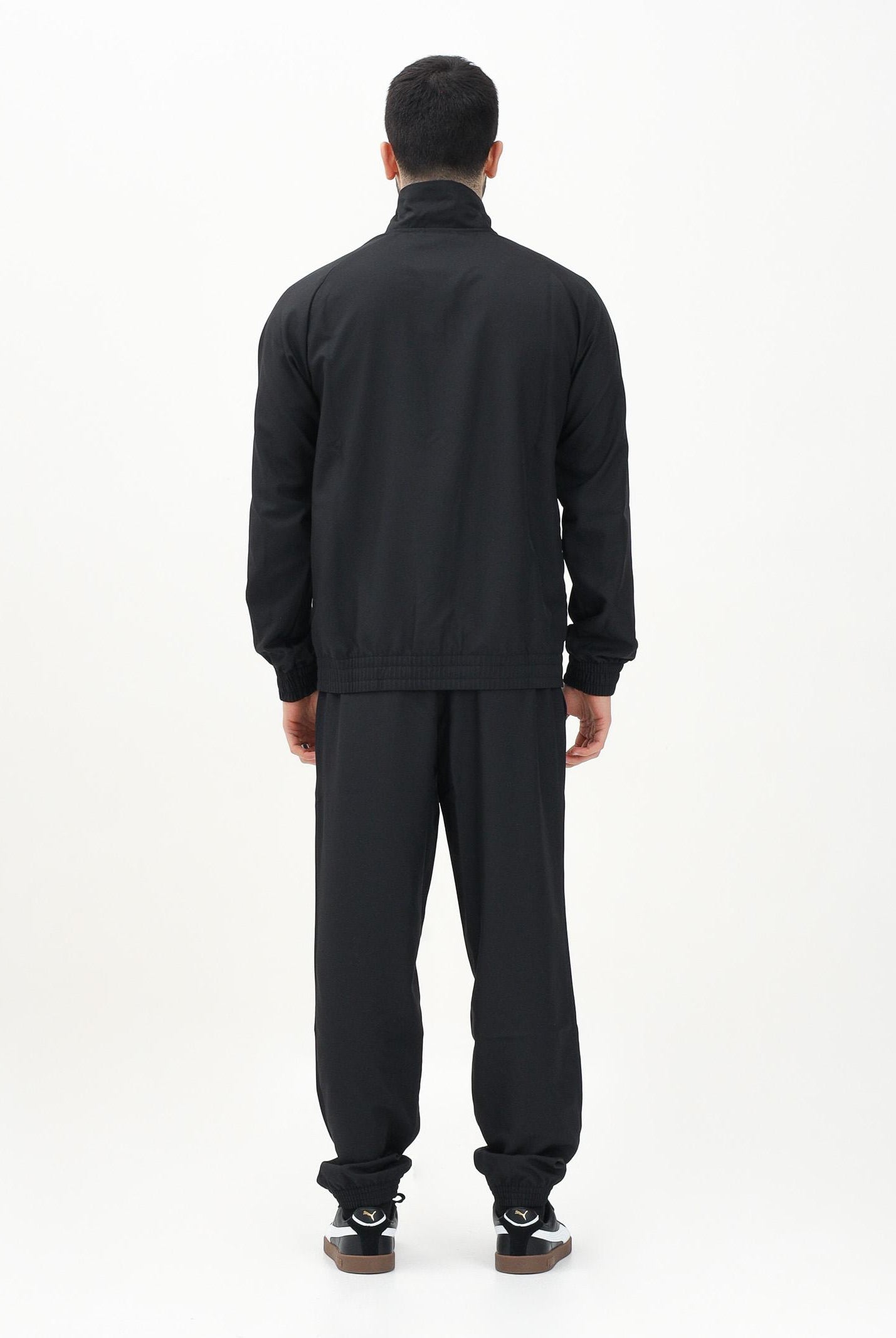 PUMA Tuta nera da uomo con piping intrecciato 684849 01 PUMA