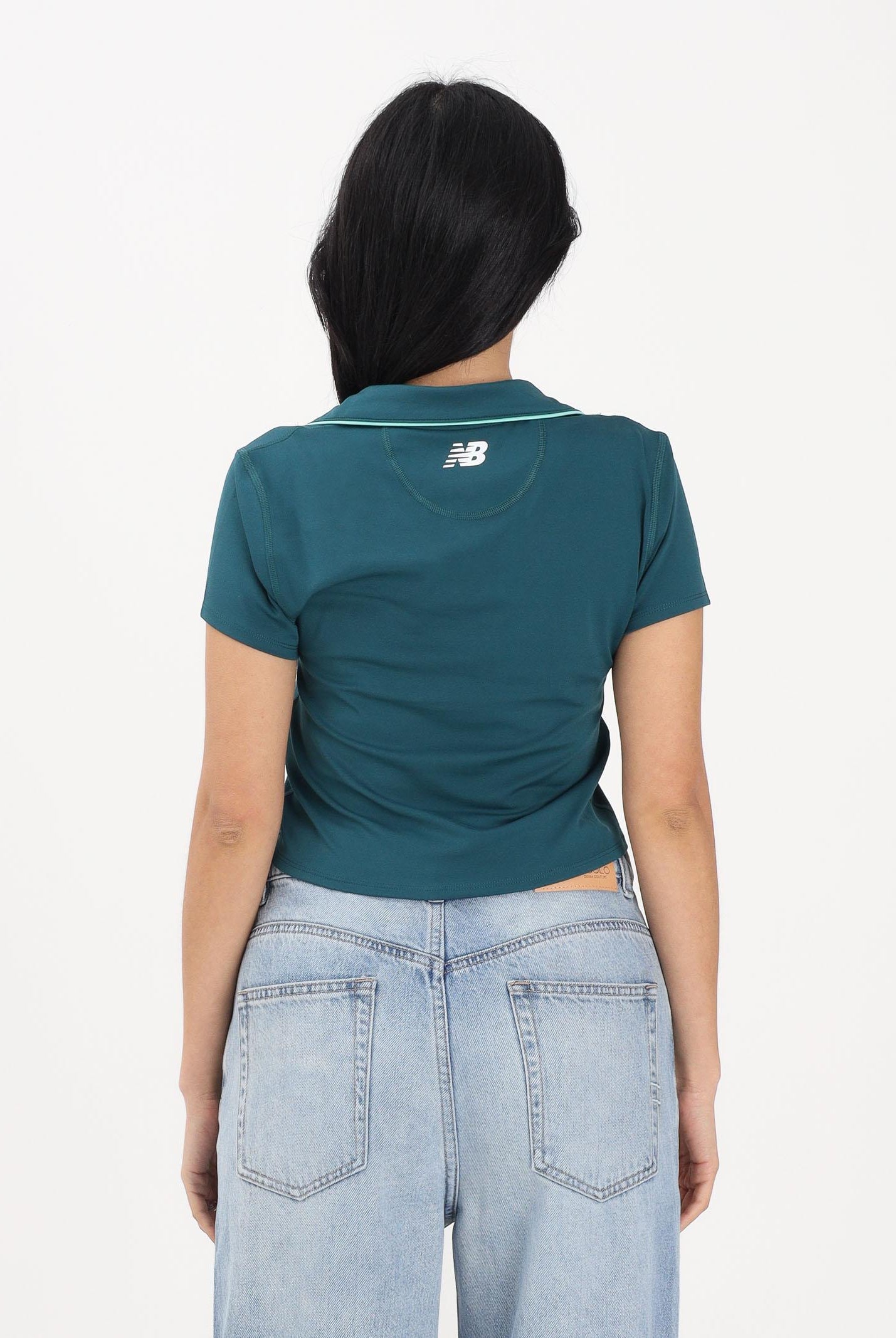 NEW BALANCE Polo a manica corta ottanio da donna WT61S8TLAAV . NEW BALANCE