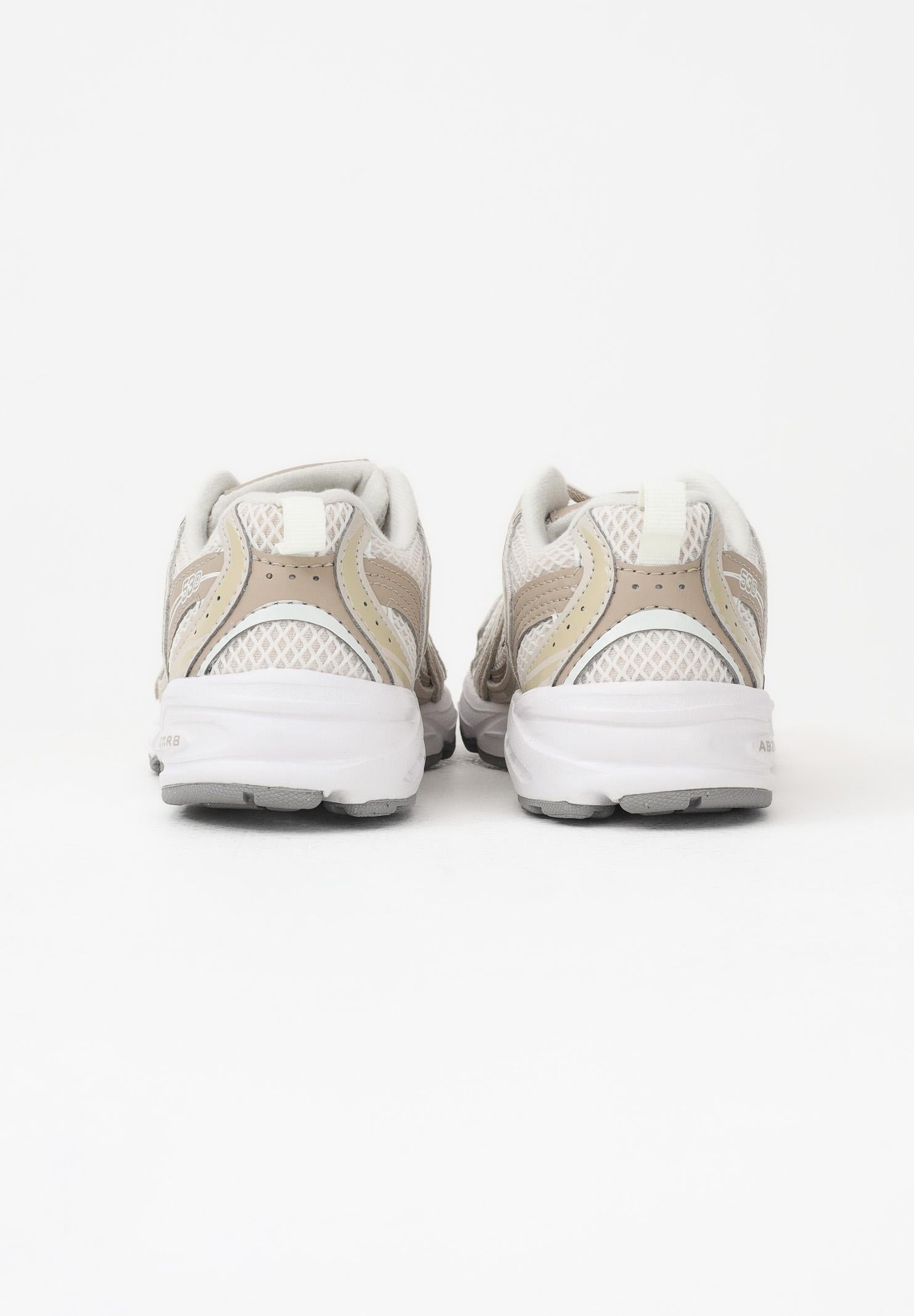 NEW BALANCE Sneakers 530 Bungee Lace panna e beige per bambino e bambina P5305C7 . NEW BALANCE