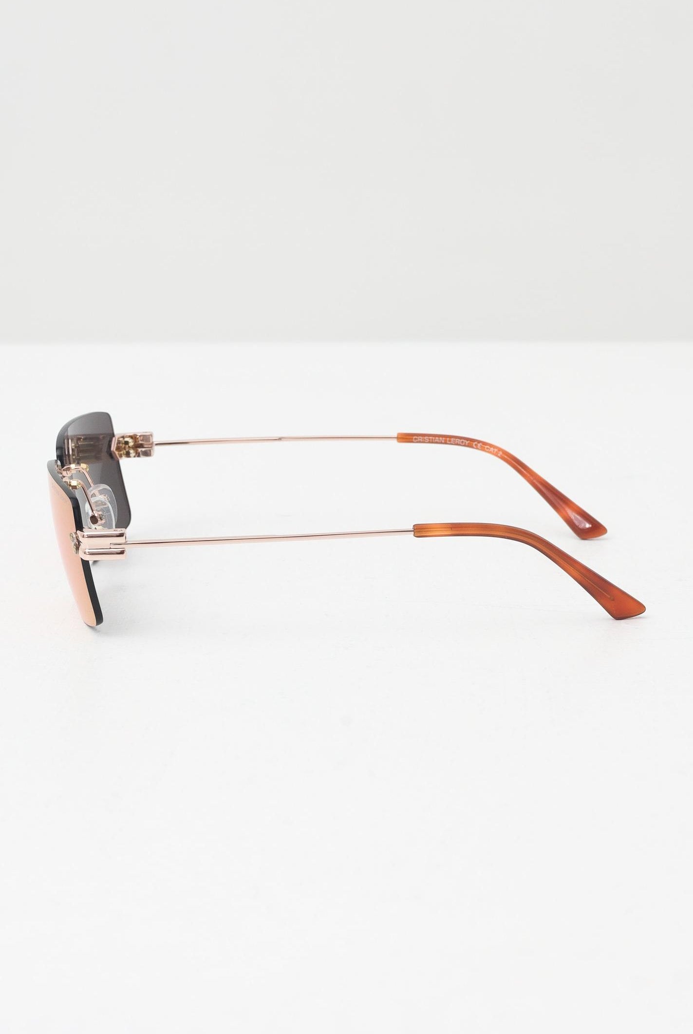 CRISTIAN LEROY Occhiali da sole per uomo e donna con lenti con riflessi iridescenti e montatura rimless 15047 04 CRISTIAN LEROY