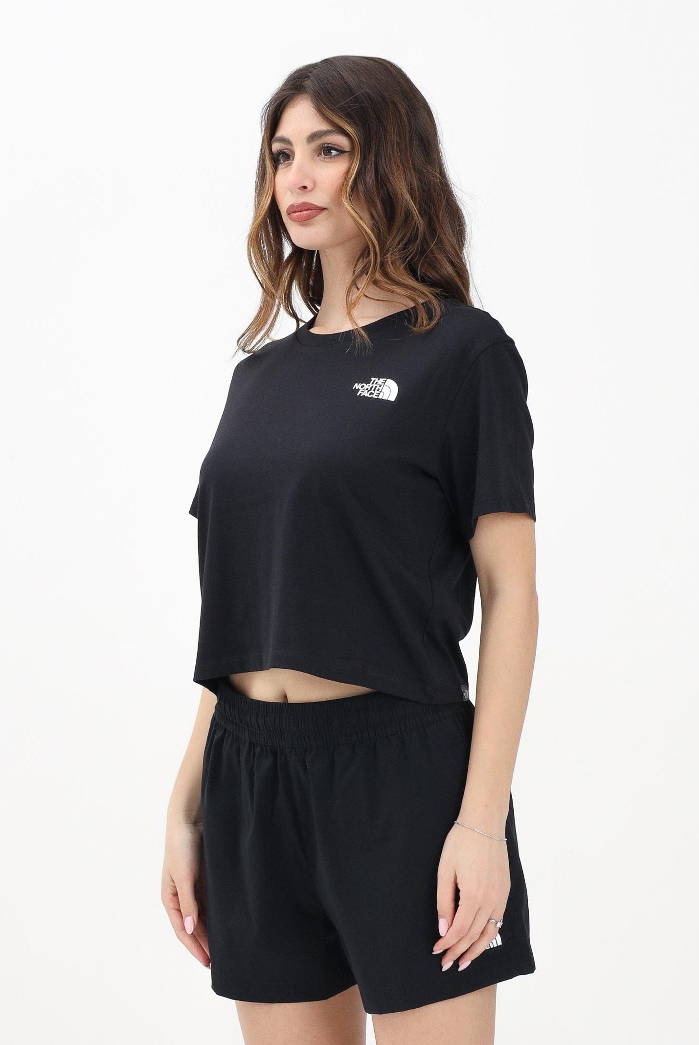 THE NORTH FACE T-shirt a manica corta Cropped nera da donna NF0A87U4JK31 . THE NORTH FACE