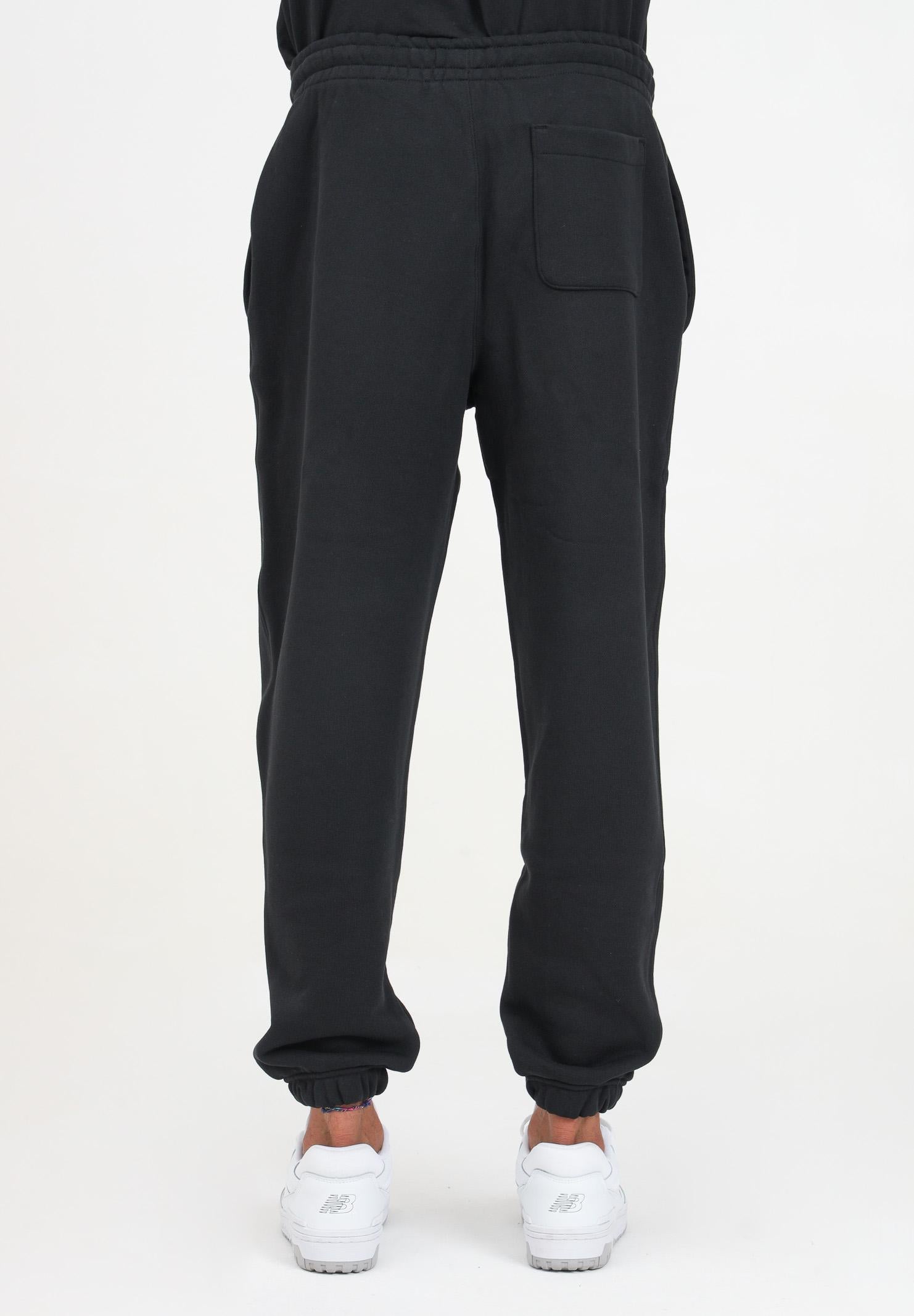 Pantalone sportivo nero per uomo e donna con patch logo XH2750 031 LACOSTE