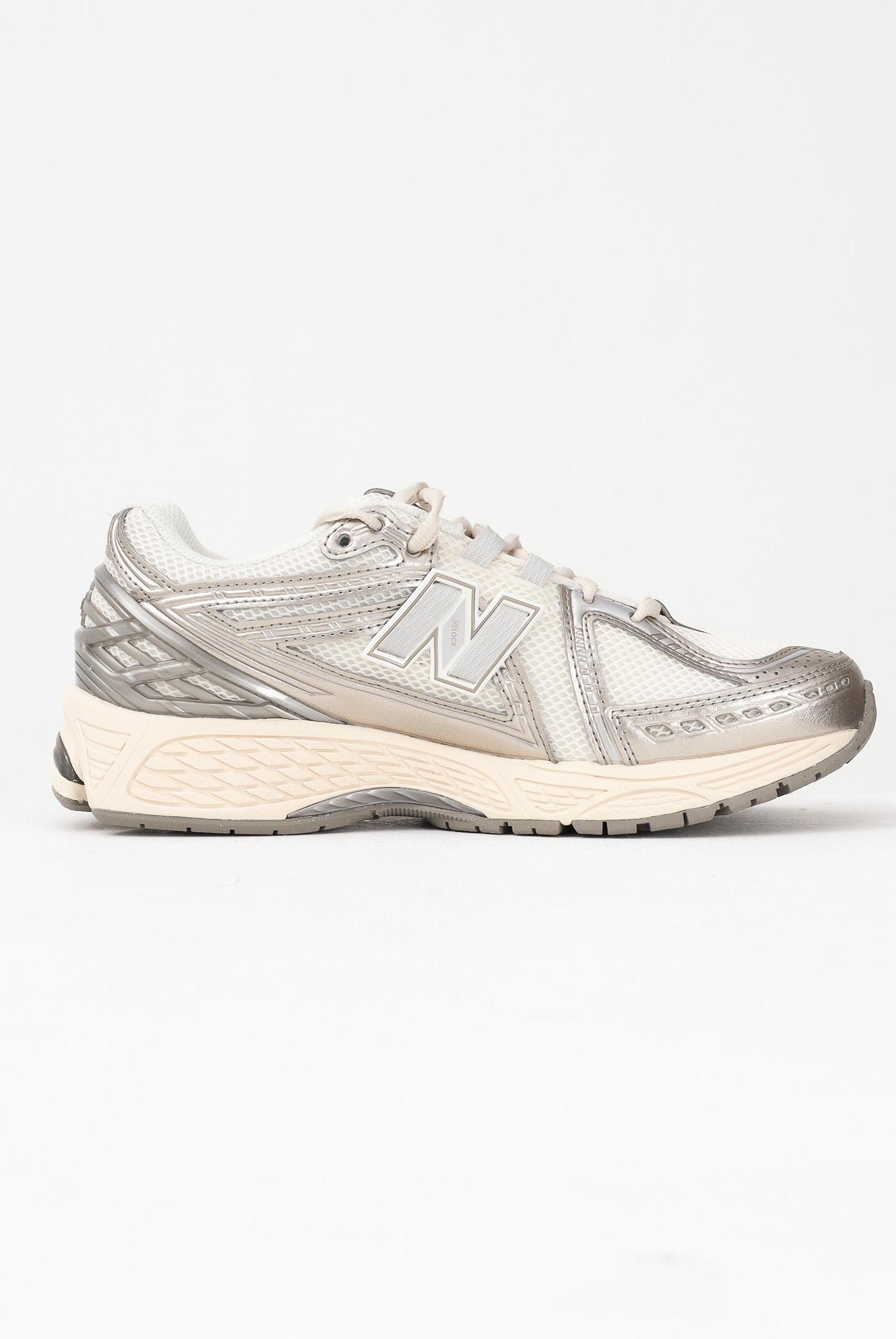 NEW BALANCE Sneakers 1906R panna e argento per uomo e donna U1906RCN . NEW BALANCE
