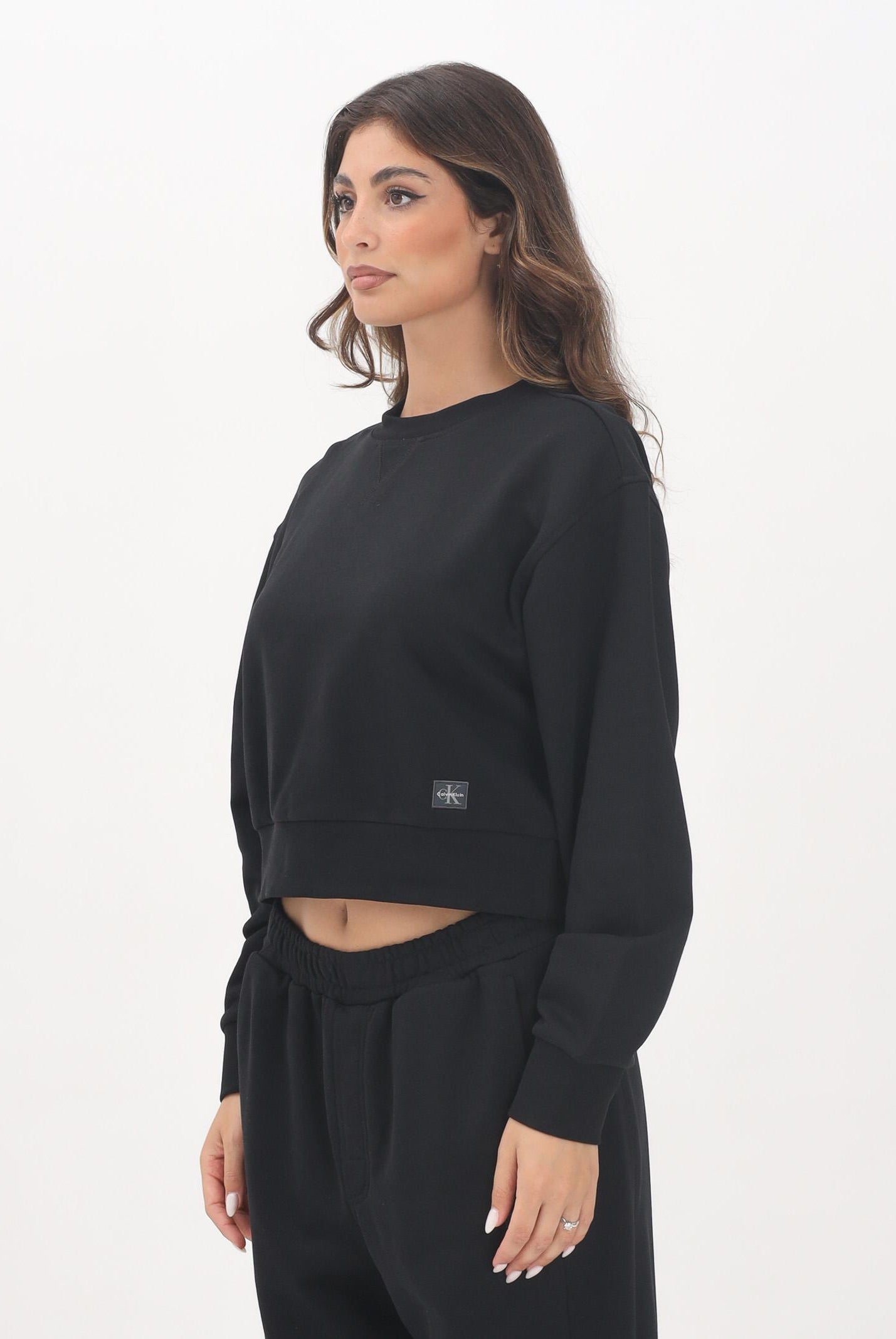 CALVIN KLEIN JEANS Felpa girocollo nera da donna con patch logo LV047C911GUB1 CALVIN KLEIN JEANS