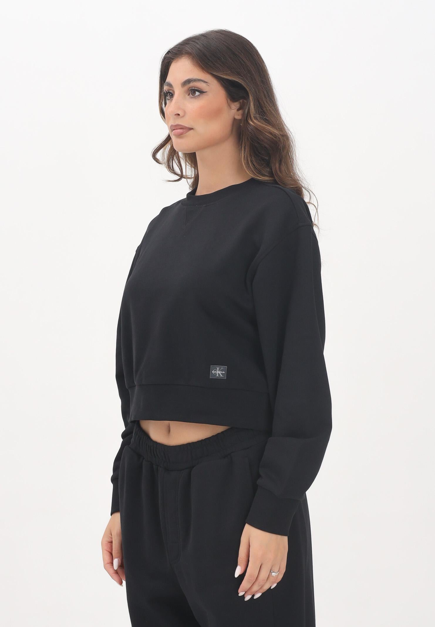 CALVIN KLEIN JEANS Felpa girocollo nera da donna con patch logo LV047C911GUB1 CALVIN KLEIN JEANS