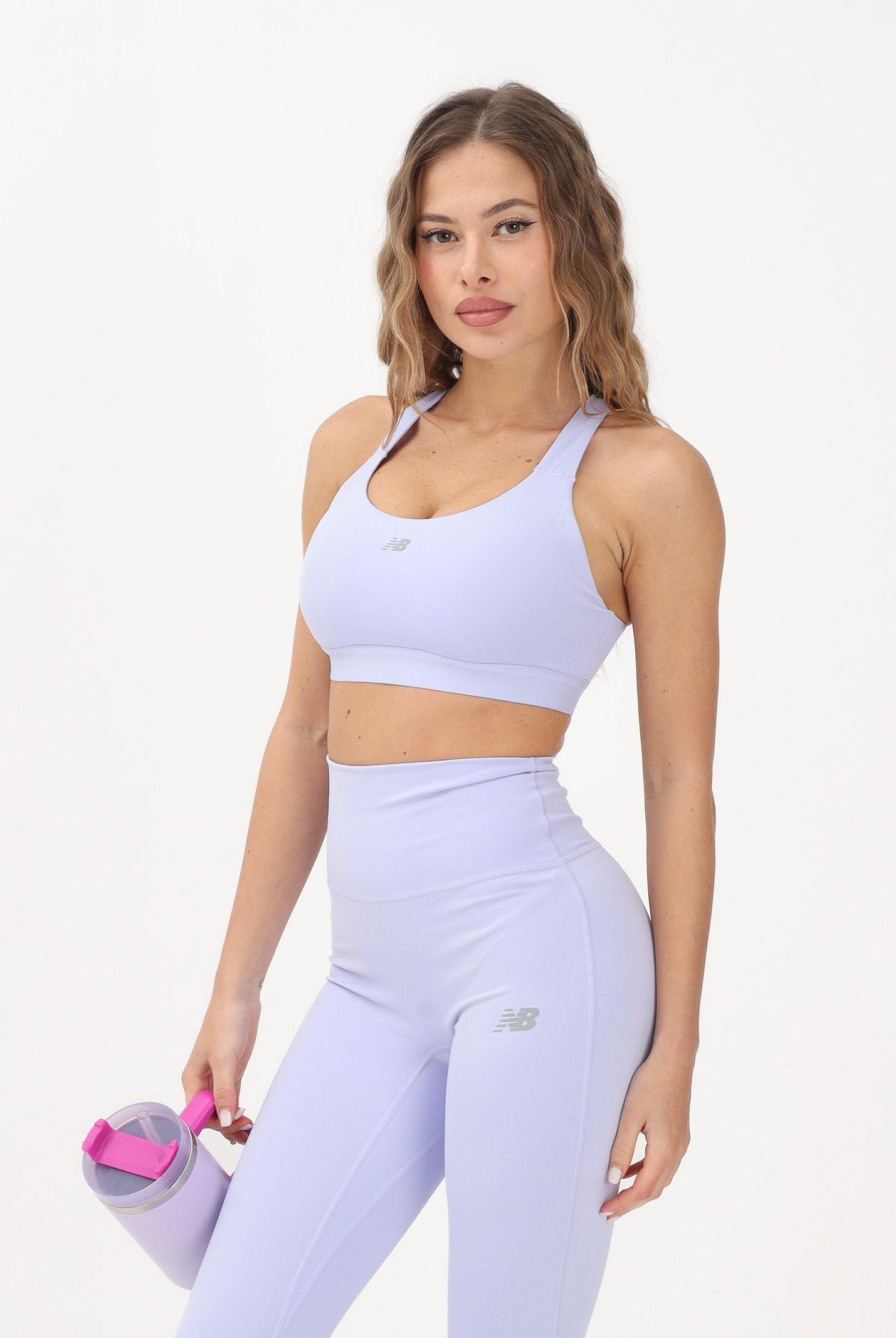 NEW BALANCE Bralette sportiva NB Essential lilla da donna WB51035DYK . NEW BALANCE