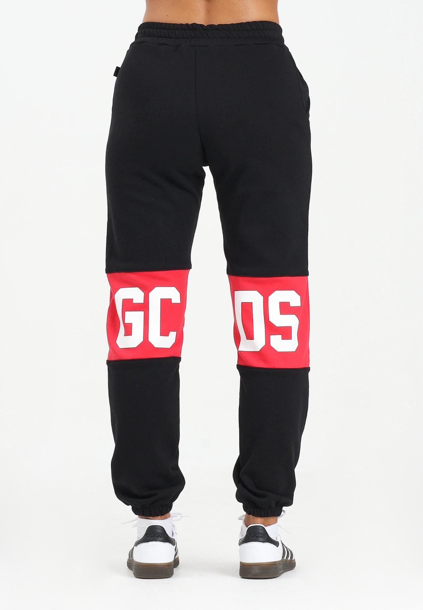 GCDS Pantalone sportivo nero per donna, ragazzi e bambini con fascia a contrasto e logo B2JU3017BA2 99 GCDS