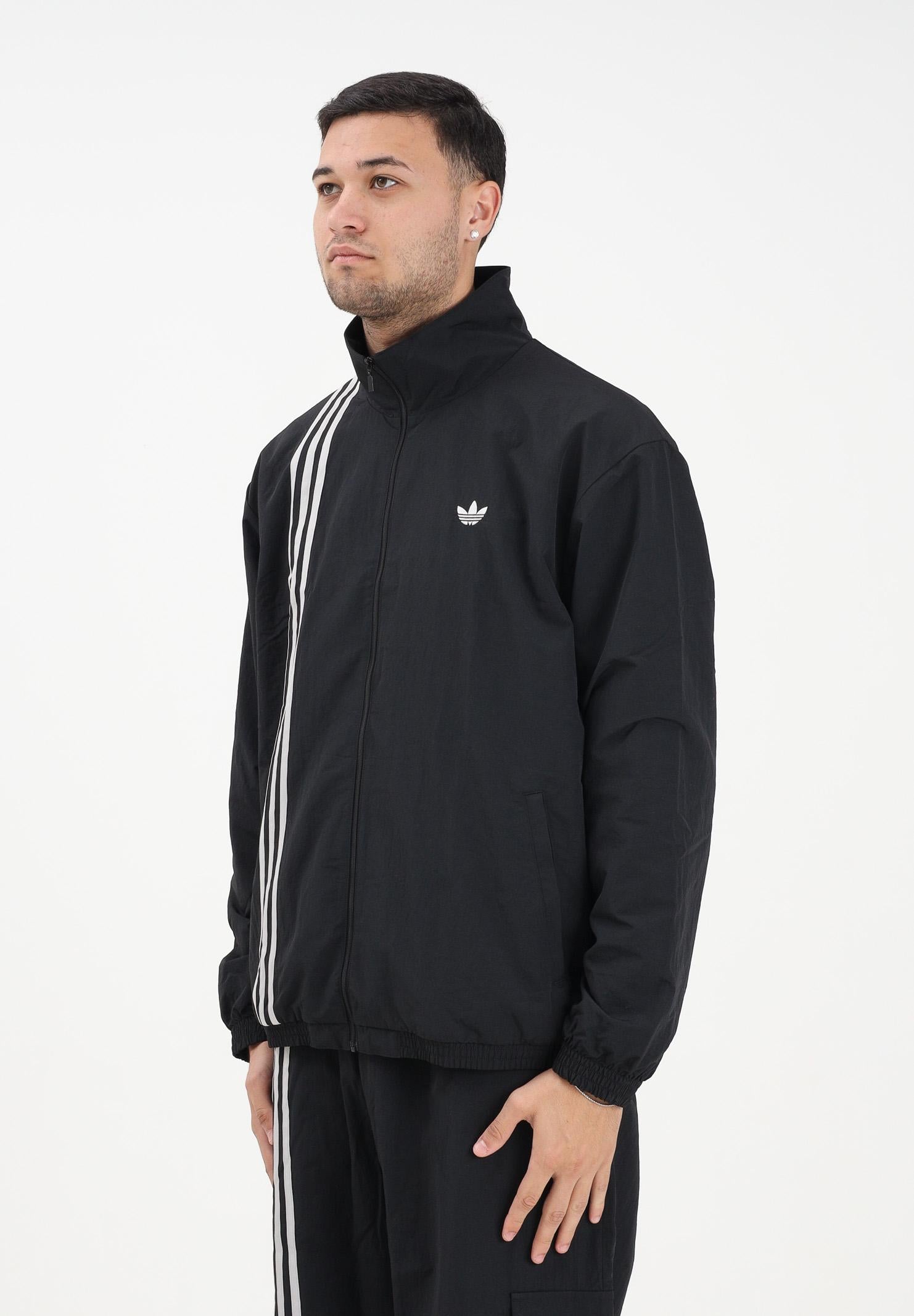 ADIDAS ORIGINALS Giacca a vento Firebird nera da uomo JV9882 . ADIDAS ORIGINALS