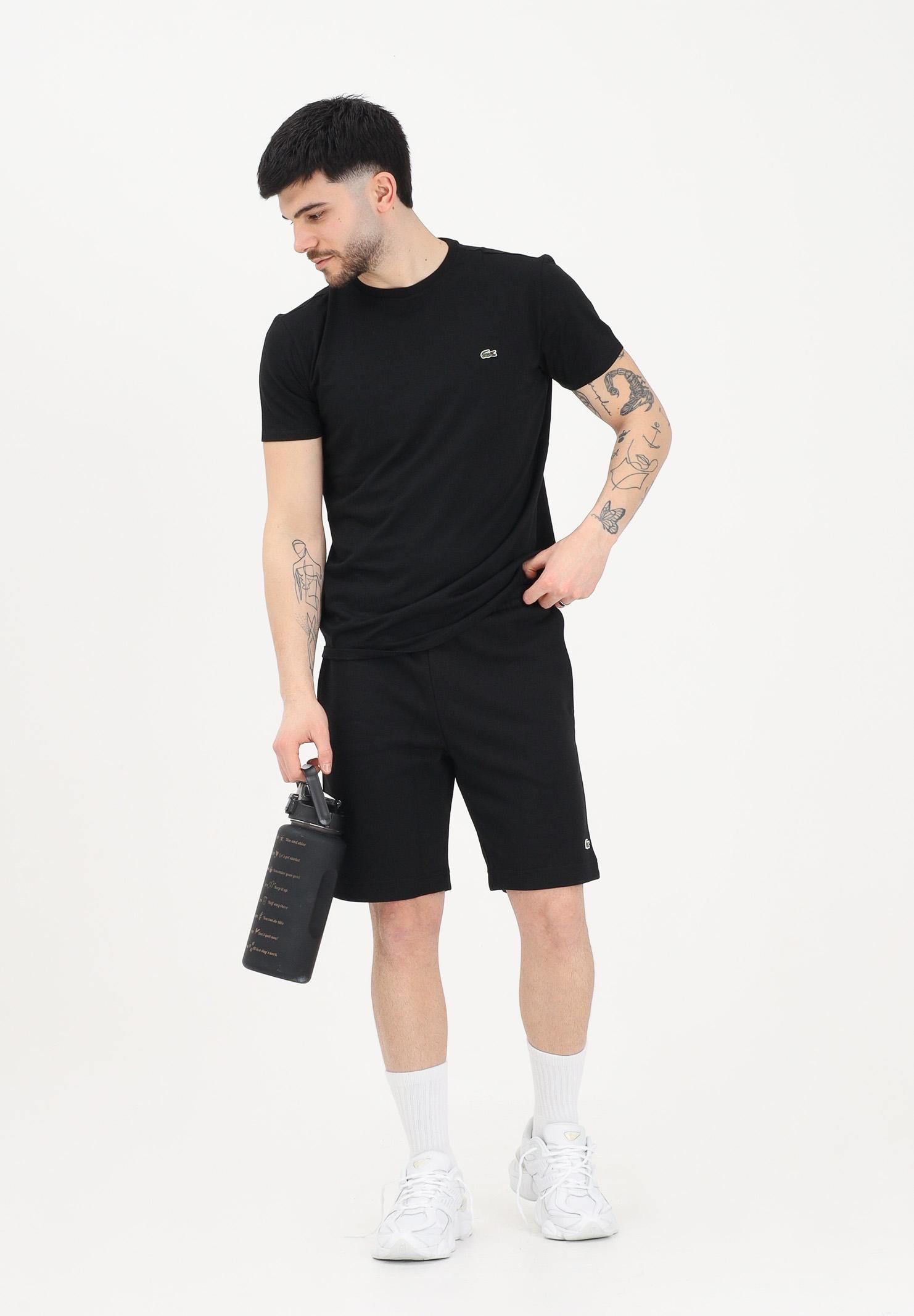LACOSTE Shorts sportivo nero per uomo e donna con logo GH9860 031 LACOSTE