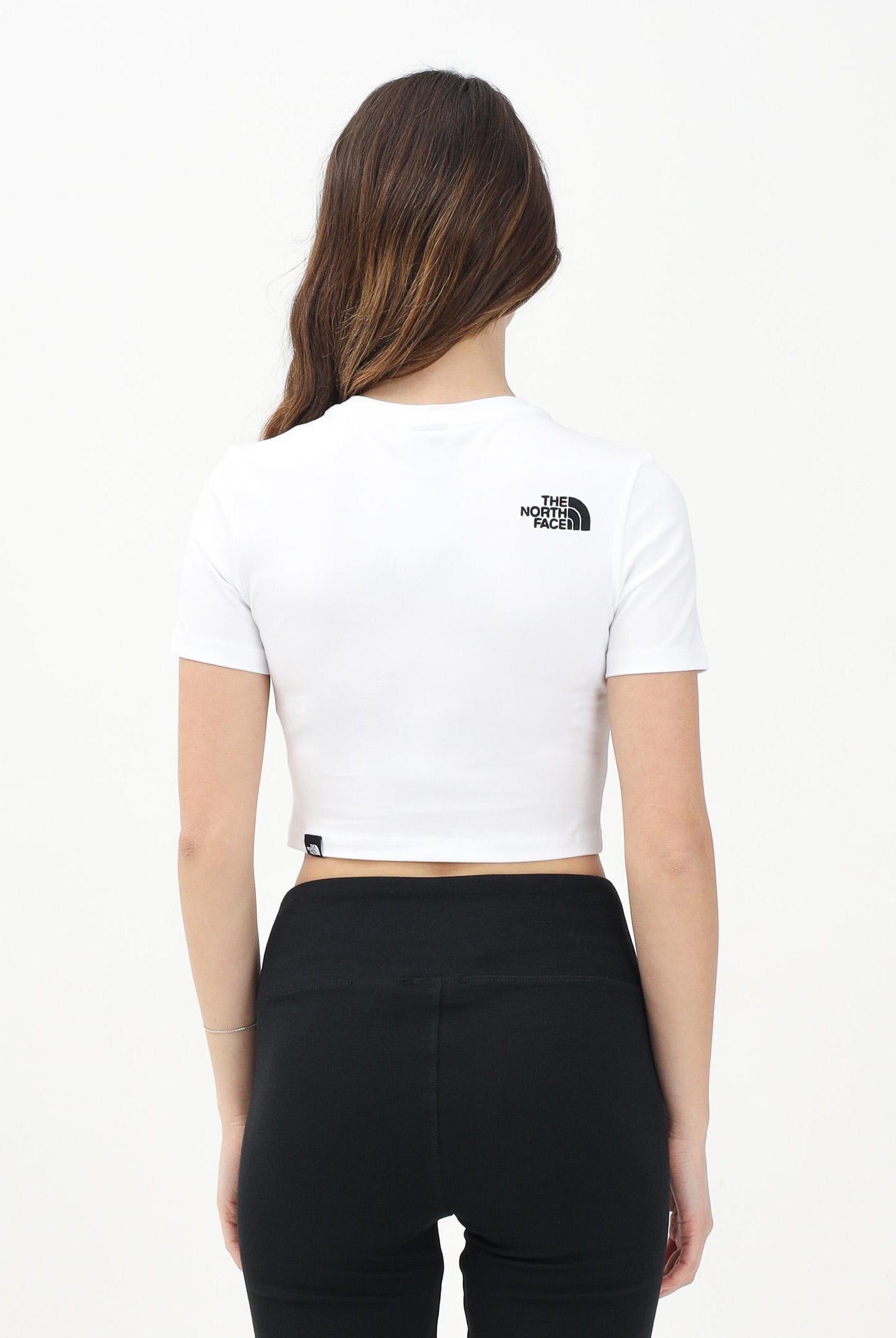 THE NORTH FACE T-shirt crop a manica corta bianca da donna con logo NF0A55AOFN41 . THE NORTH FACE