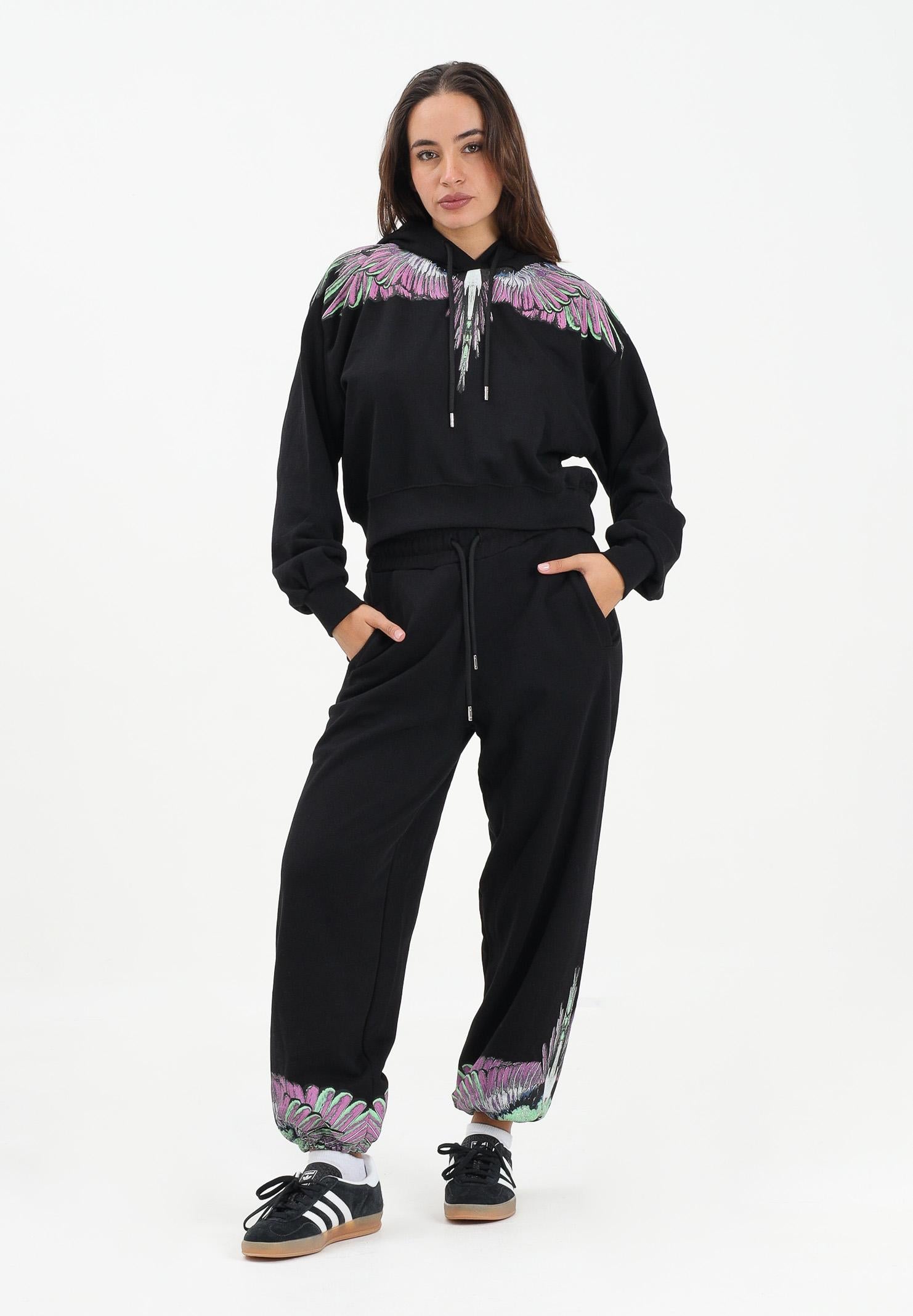 MARCELO BURLON COUNTY OF MILAN Pantalone sportivo nero da donna con stampa ali sul fondo 25ICM30074 NEPI MARCELO BURLON COUNTY OF MILAN