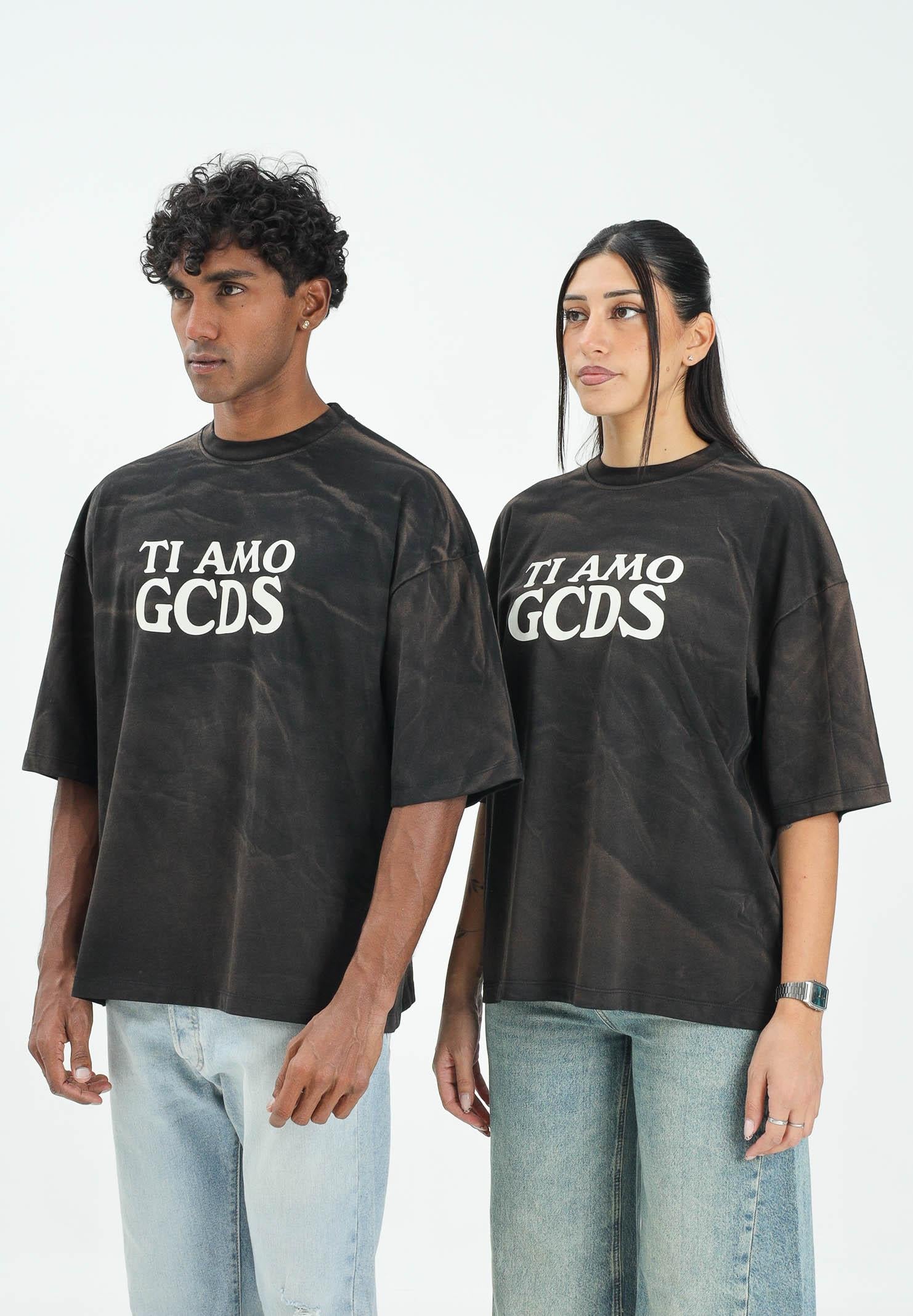 GCDS T-shirt a manica corta nera per uomo e donna con effetto lavato e stampa B2CM2315JF1 99 GCDS