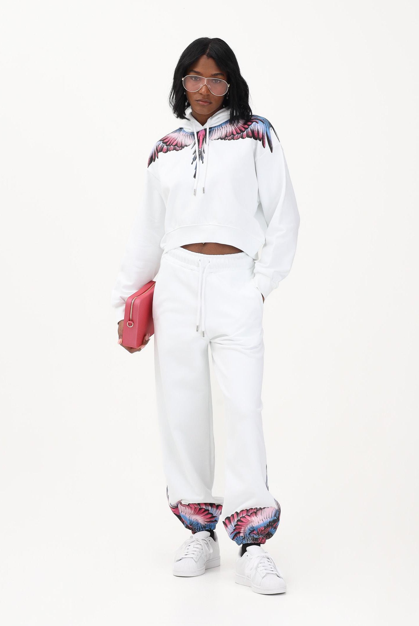 MARCELO BURLON COUNTY OF MILAN Pantalone sportivo bianco da donna con stampa sul fondo 26ECM30107 BICERO MARCELO BURLON COUNTY OF MILAN