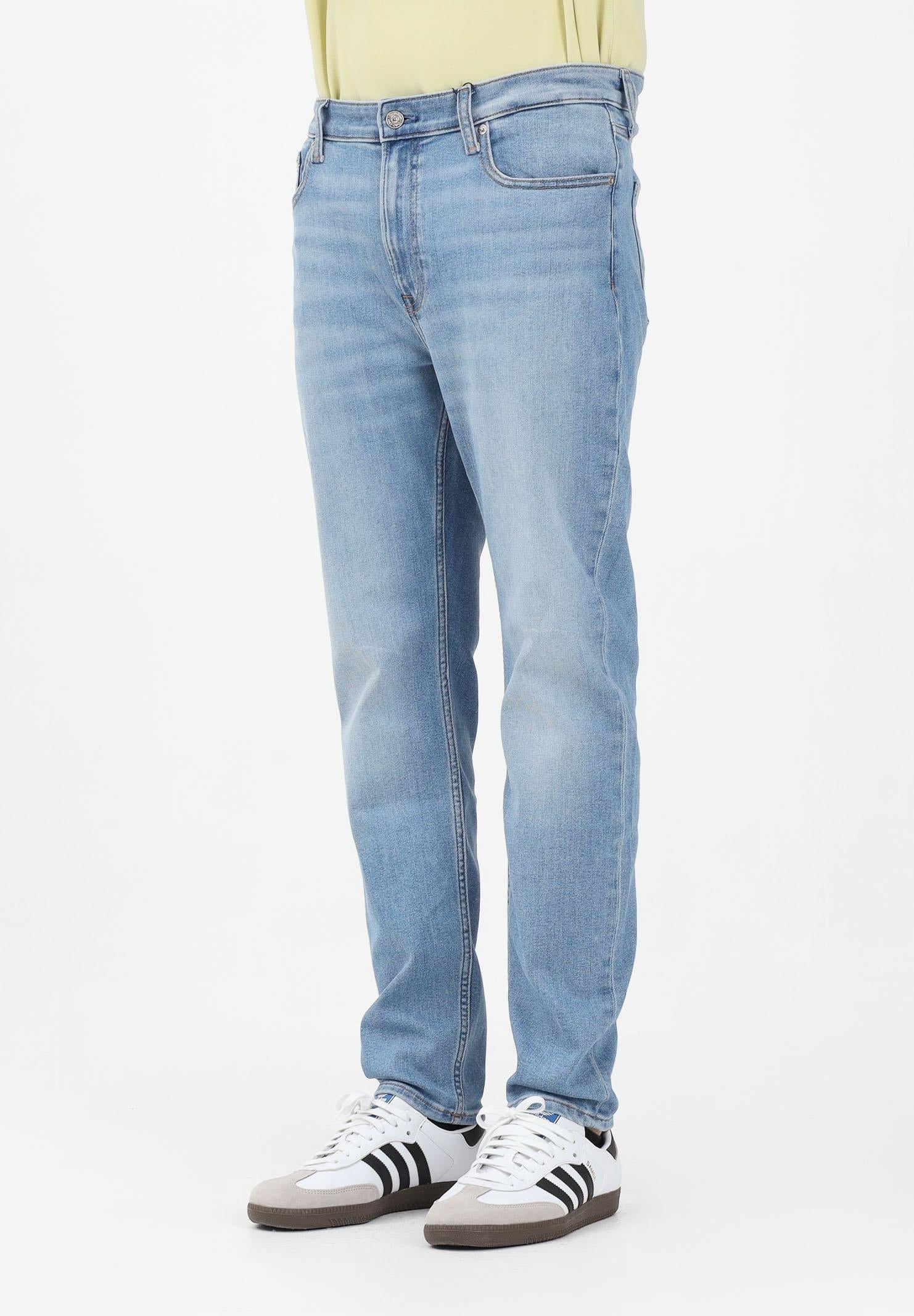 CALVIN KLEIN JEANS Jeans Slim Tapered in denim chiaro da uomo LV04RE780G3N2 . CALVIN KLEIN JEANS