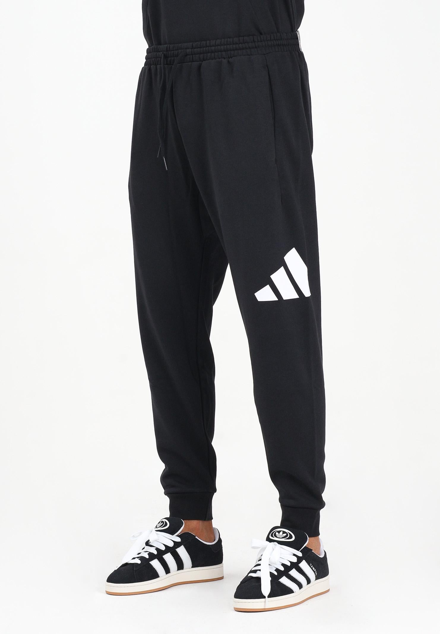 ADIDAS PERFORMANCE Pantalone sportivo Essentials Big Logo Cuffed Fleece nero da uomo IN6147 . ADIDAS PERFORMANCE