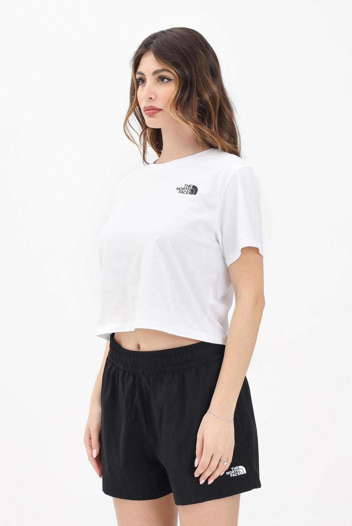 THE NORTH FACE T-shirt a manica corta Cropped bianca da donna con logo NF0A87U4FN41 . THE NORTH FACE