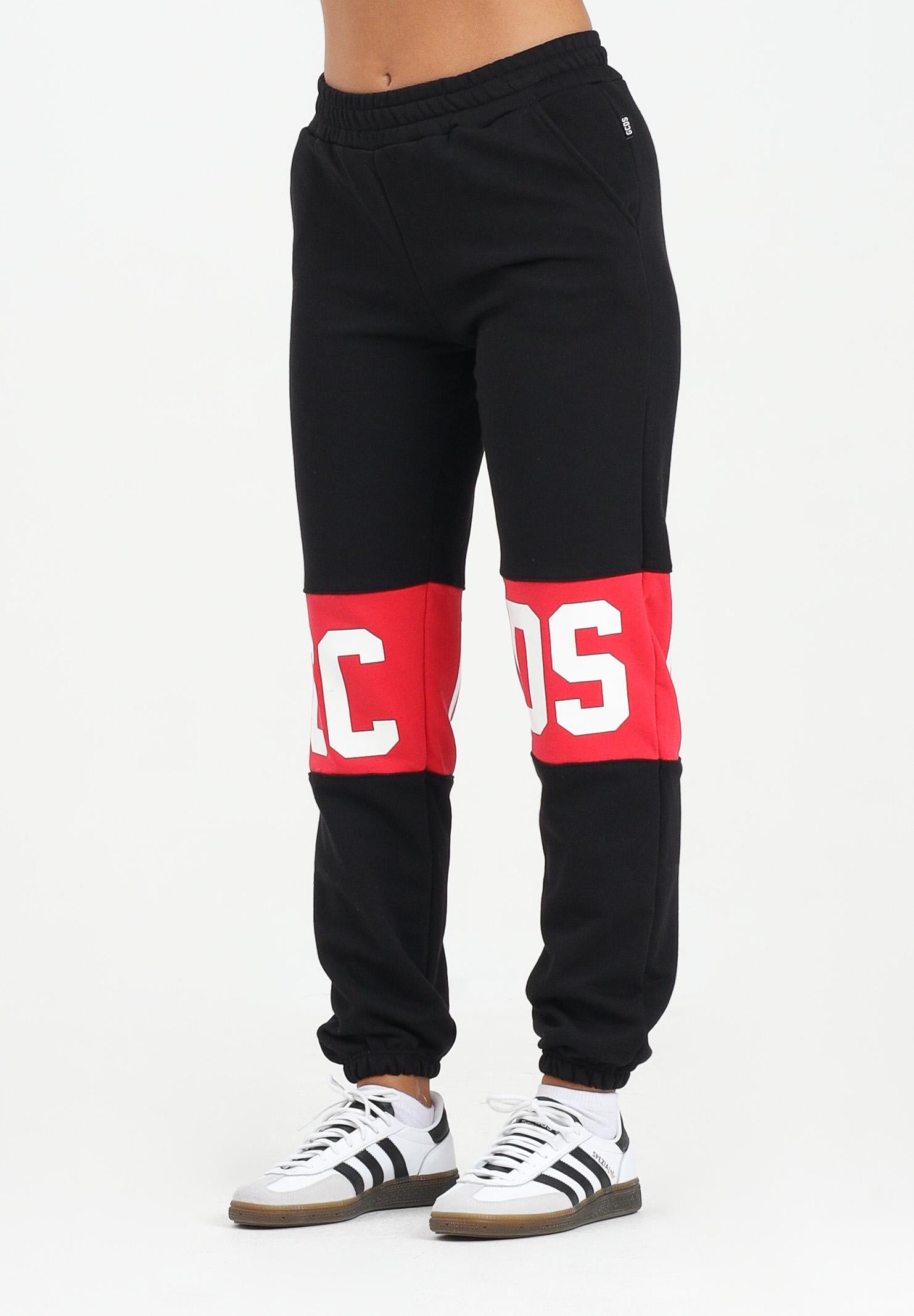 GCDS Pantalone sportivo nero per donna, ragazzi e bambini con fascia a contrasto e logo B2JU3017BA2 99 GCDS