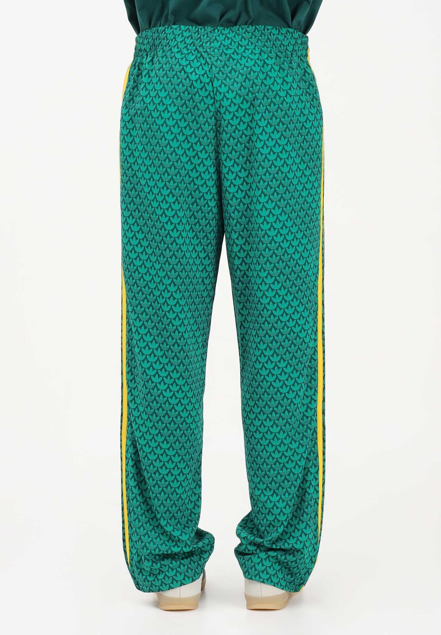 ADIDAS ORIGINALS Pantalone sportivo FIREBIRD LOOSE MONOGRAM verde e giallo da uomo KD0396 . ADIDAS ORIGINALS