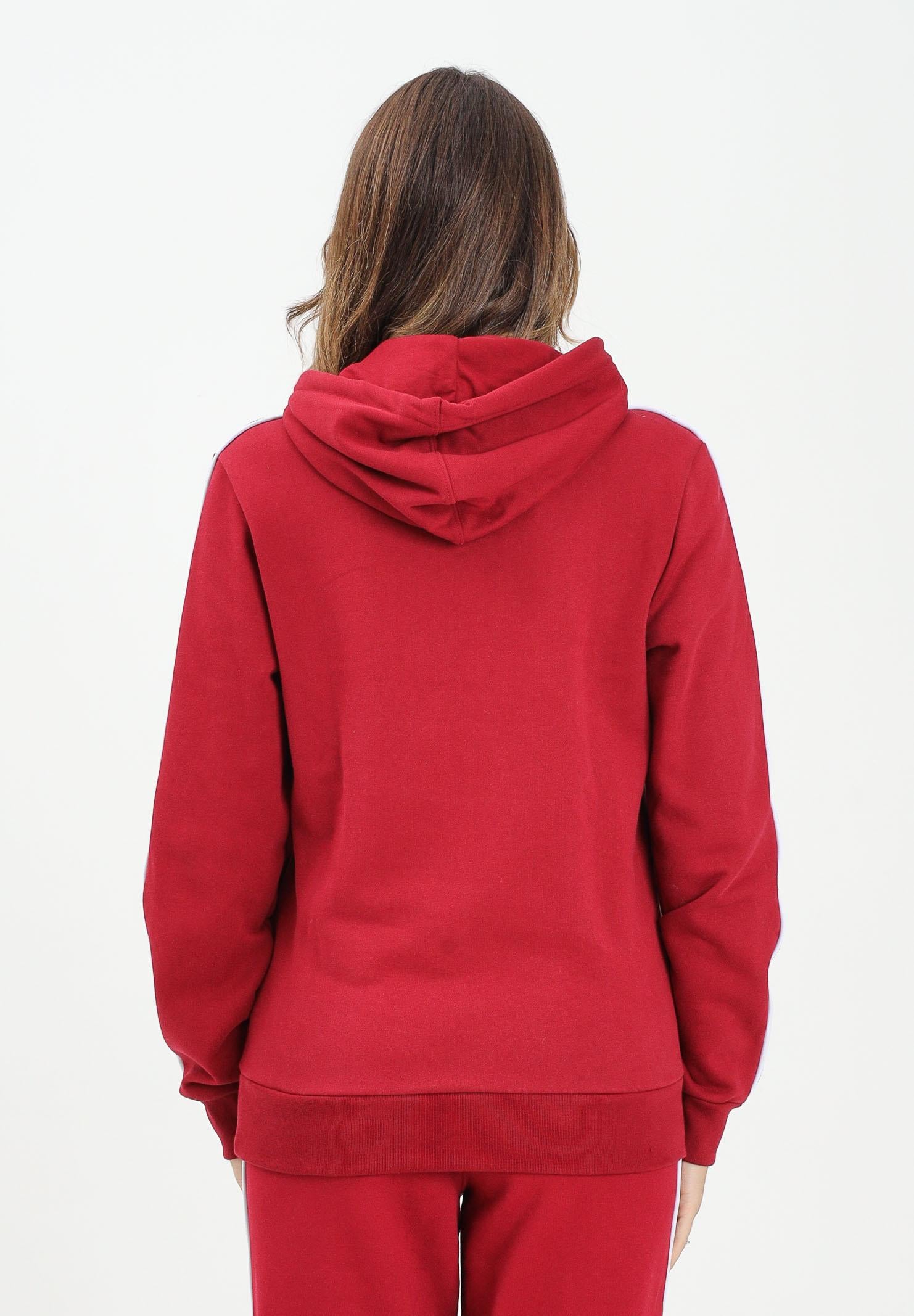 LACOSTE Felpa con cappuccio bordeaux per uomo e donna rifinita da righe logate SH9808 476 LACOSTE