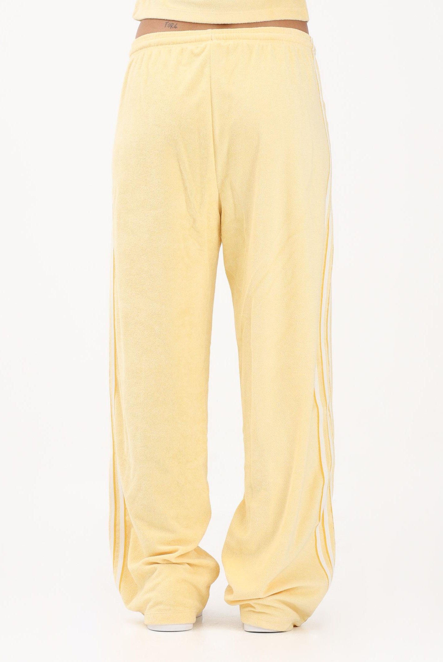 ADIDAS ORIGINALS Pantalone sportivo in spugna asciugamano Firebird giallo da donna KD1413 . ADIDAS ORIGINALS