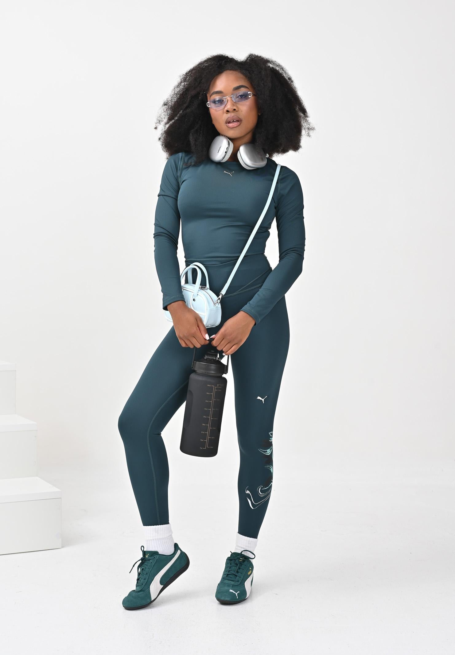 PUMA Top sportivo a maniche lunghe Terrains verde da donna 527490 75 PUMA