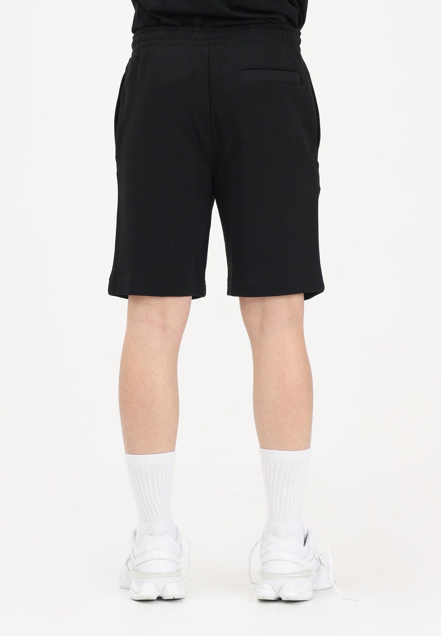 LACOSTE Shorts sportivo nero per uomo e donna con logo GH9860 031 LACOSTE