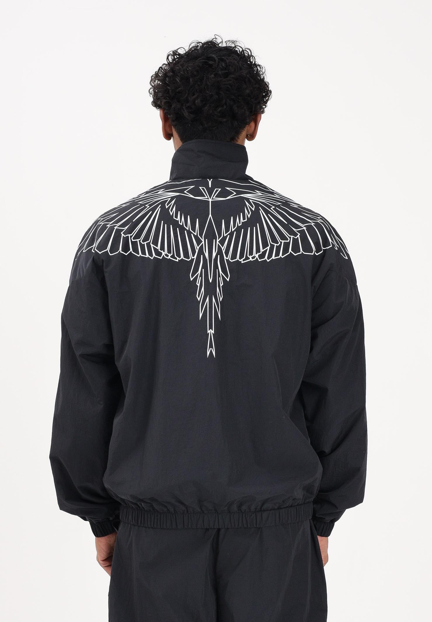 MARCELO BURLON COUNTY OF MILAN Giacca a vento nera da uomo con grafica ali S6CMMAJK075 110 MARCELO BURLON COUNTY OF MILAN