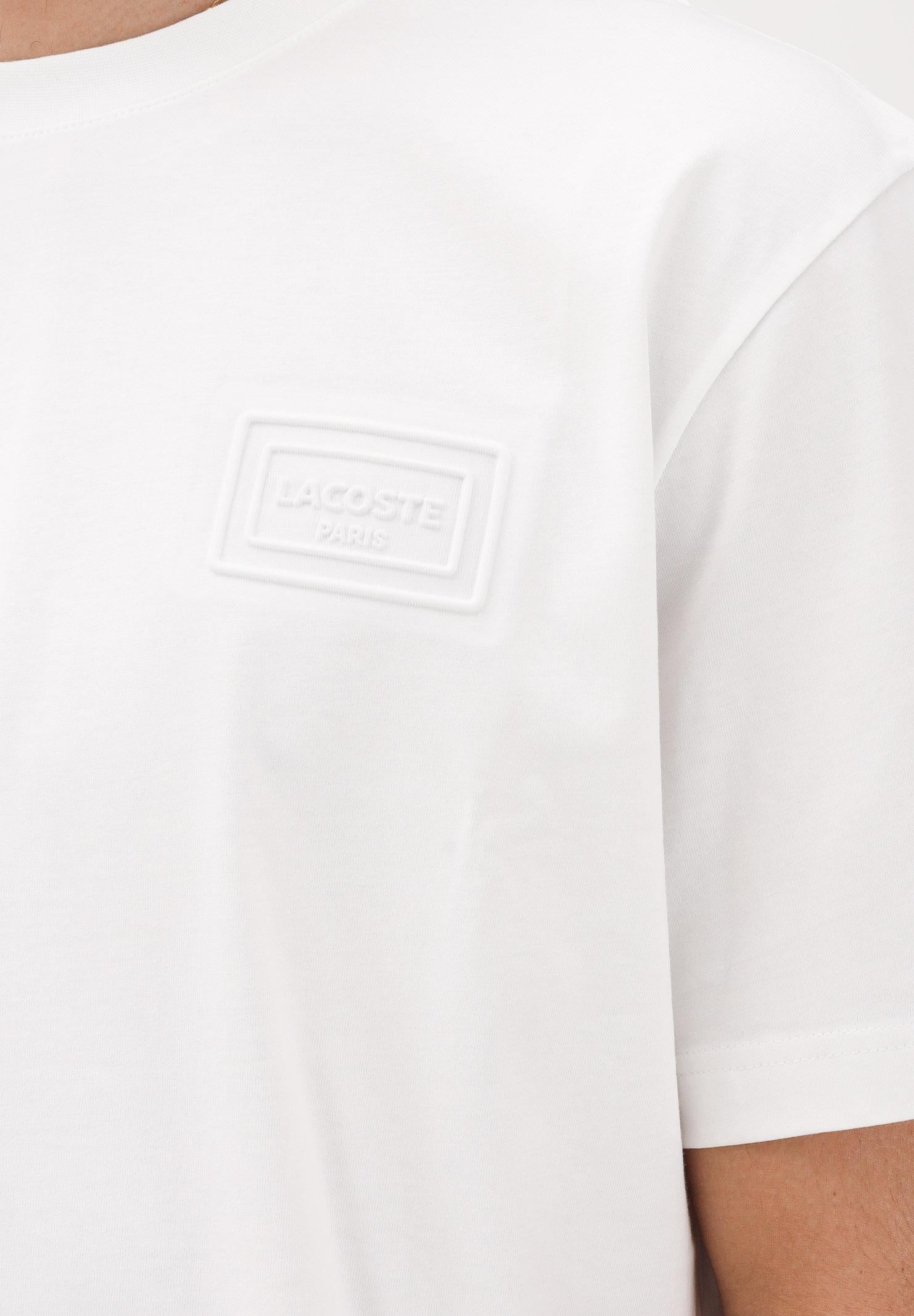 LACOSTE T-shirt a manica corta bianca da uomo con marchio goffrato<BR/> TH0753 70V LACOSTE